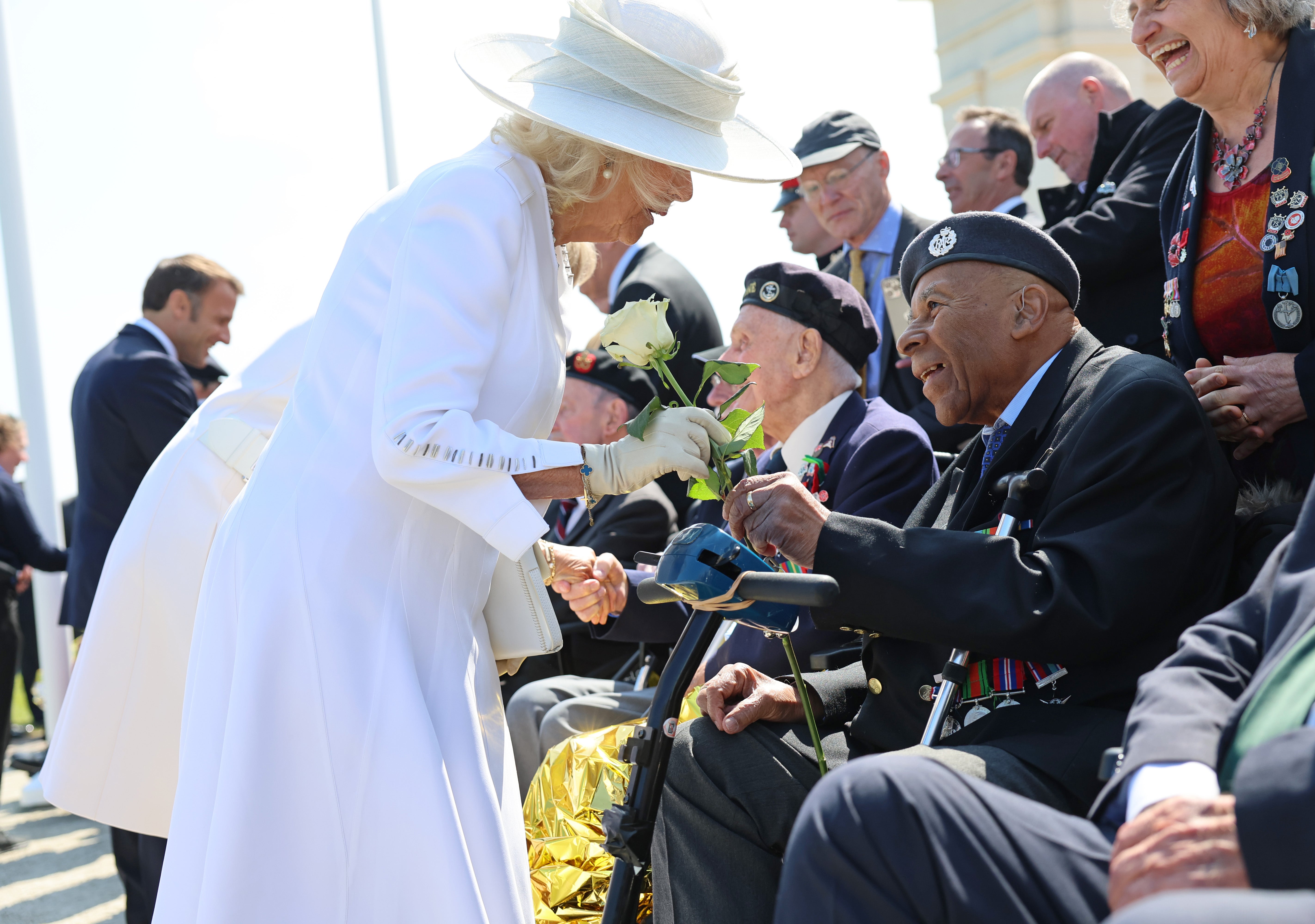 The Queen receives a white rose from Gilbert Clarke following the UK national commemorative event for the 80th anniversary of D-Day in Ver-sur-Mer, Normandy, on June 6 2024 (Chris Jackson/PA) (PA Archive)