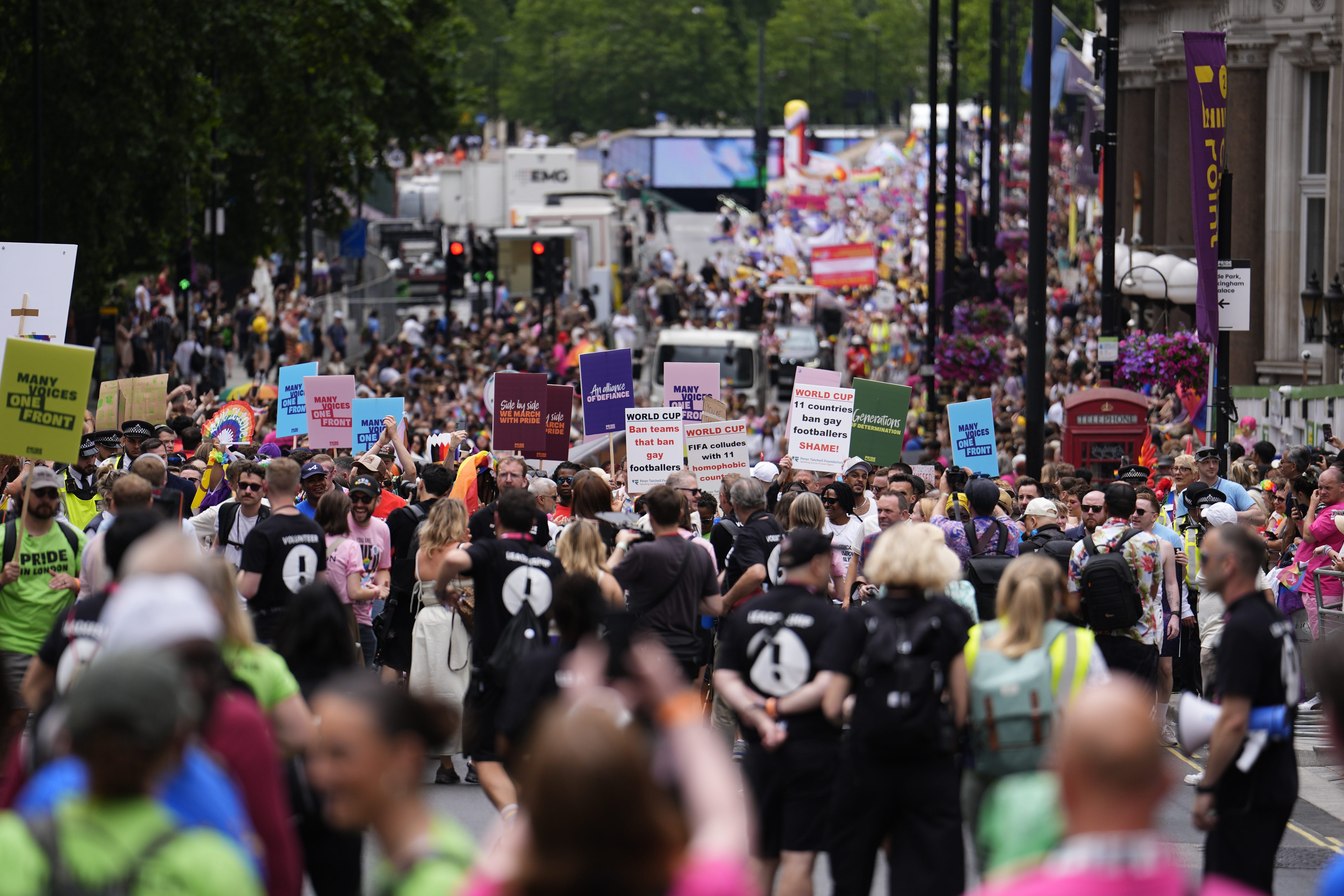 People with placards during the Pride in London parade in central London (Jordan Pettitt/PA) (PA Wire)