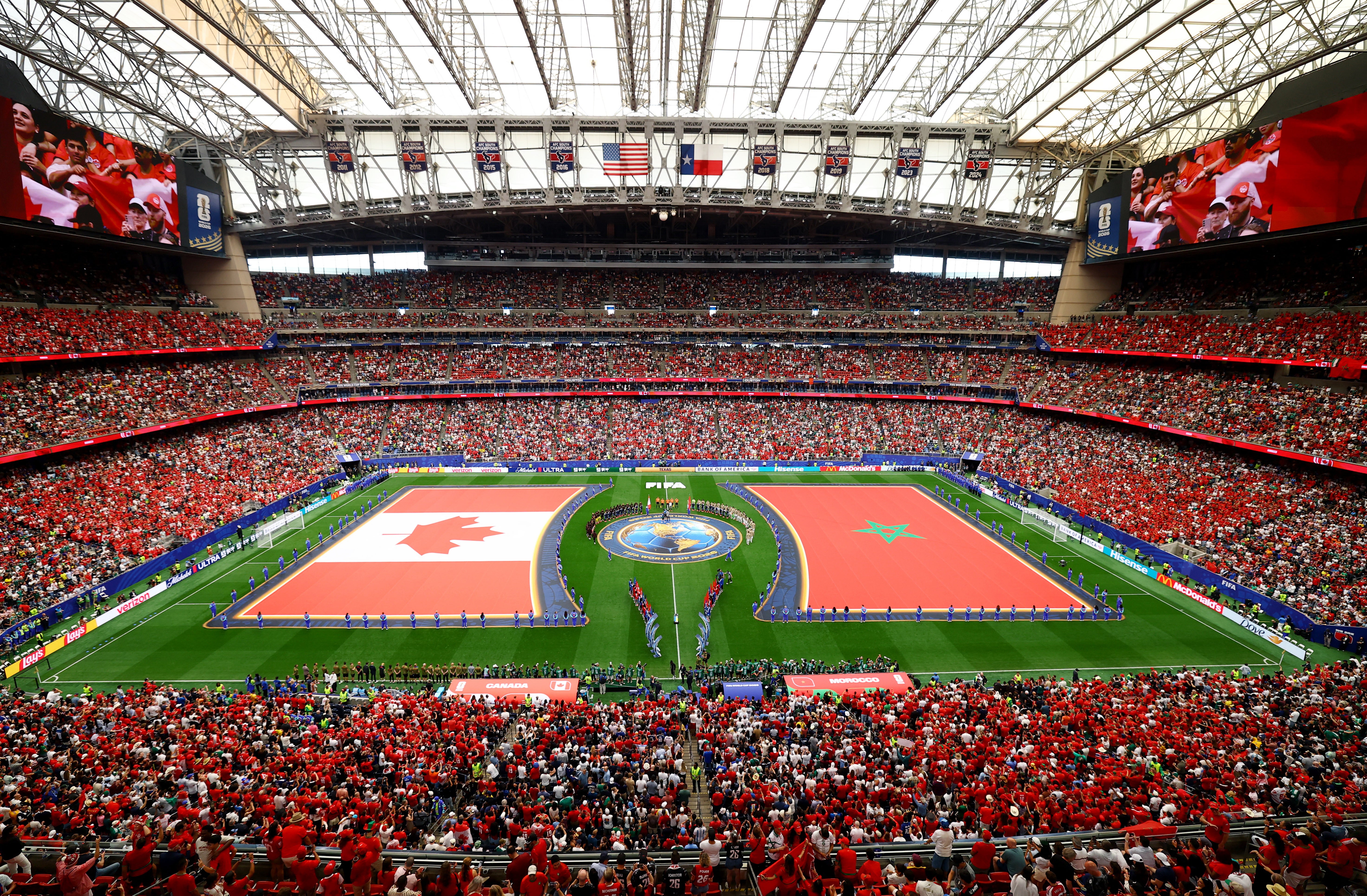 General view inside the stadium as Canada and Morocco players line up during the national anthems in Houston