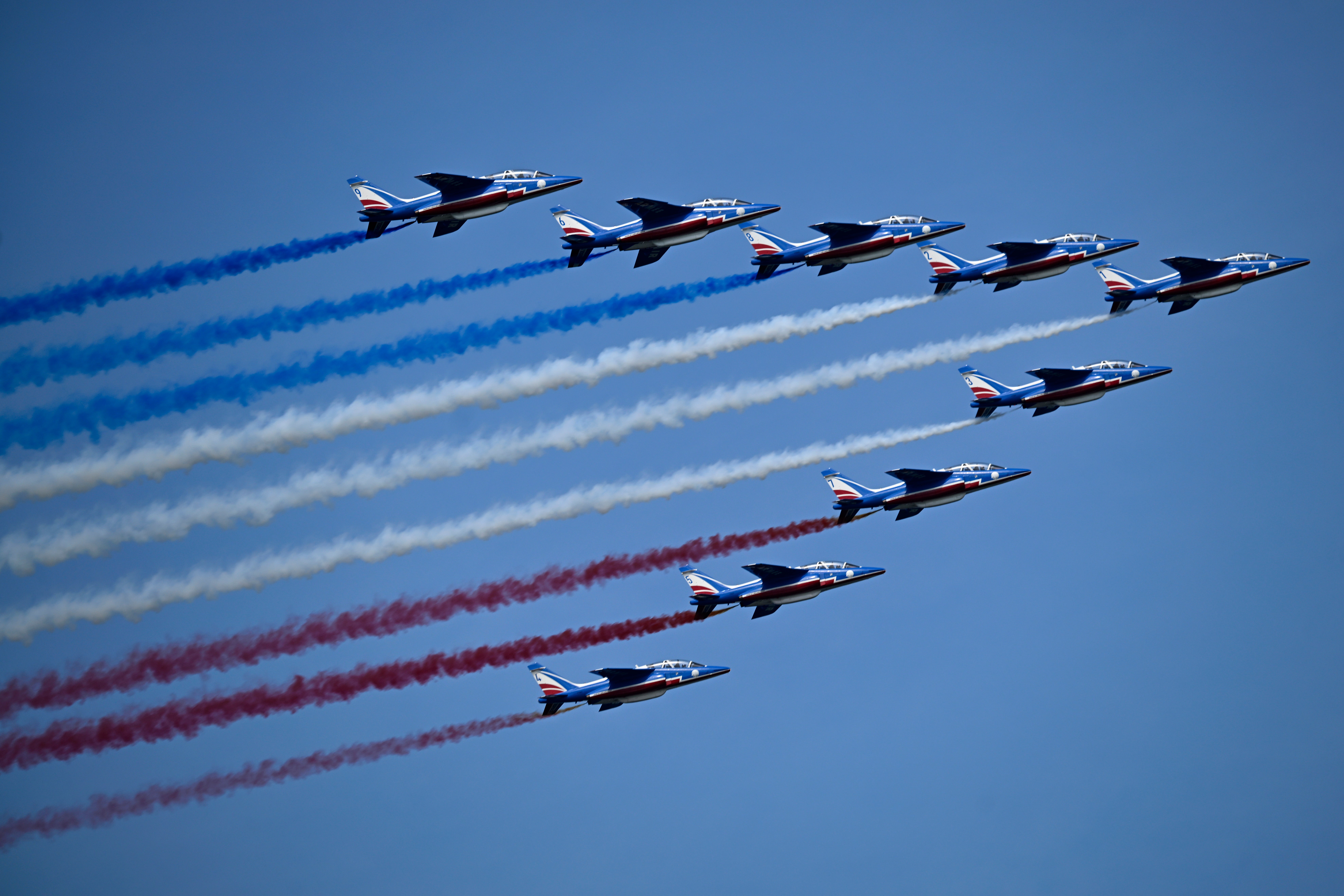 Military aircraft fly overhead during an International Naval Review in New York Harbor on July 04, 2026 in New York City