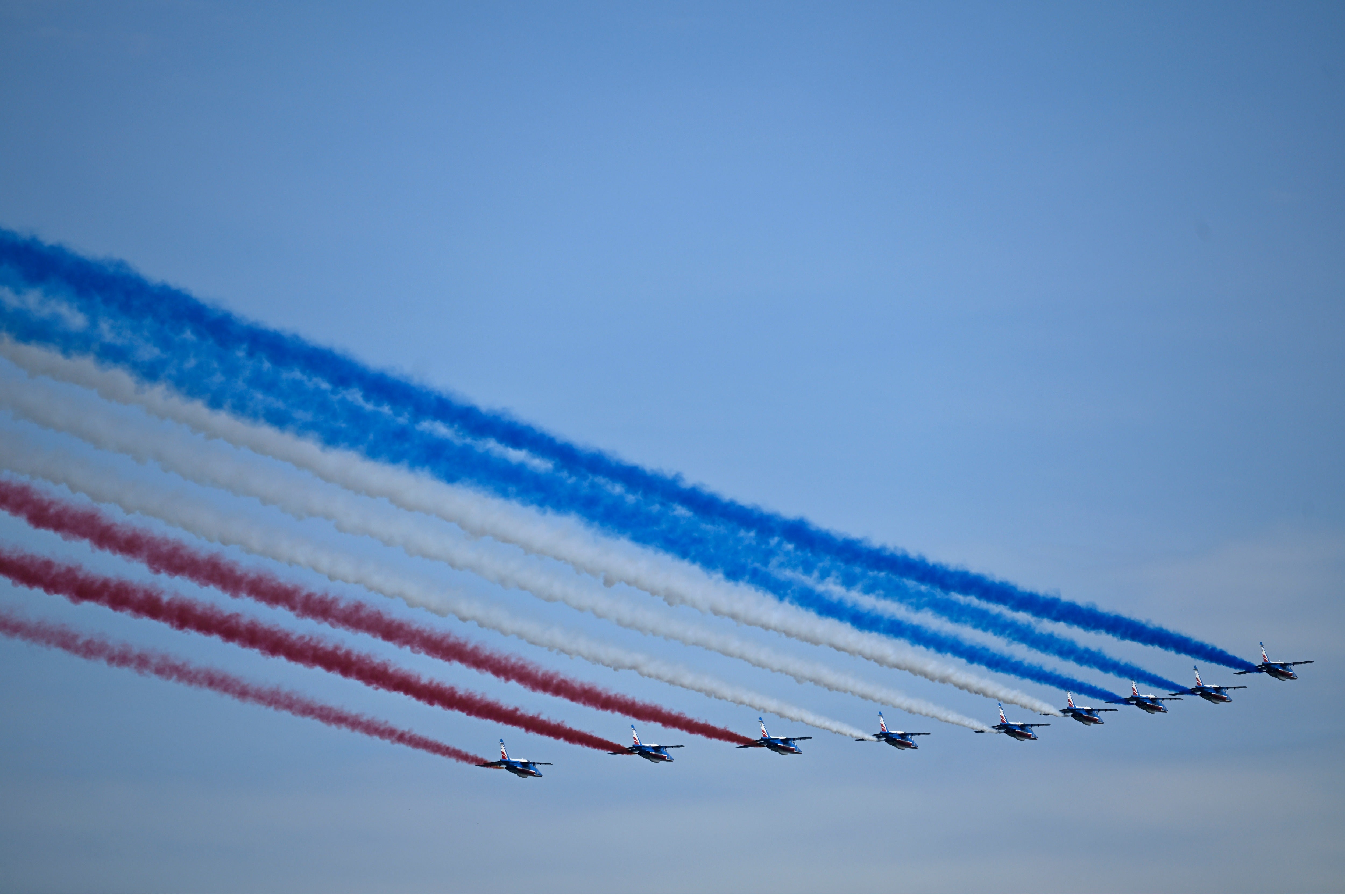 Military aircraft fly overhead during an International Naval Review in New York Harbor on July 04, 2026 in New York City