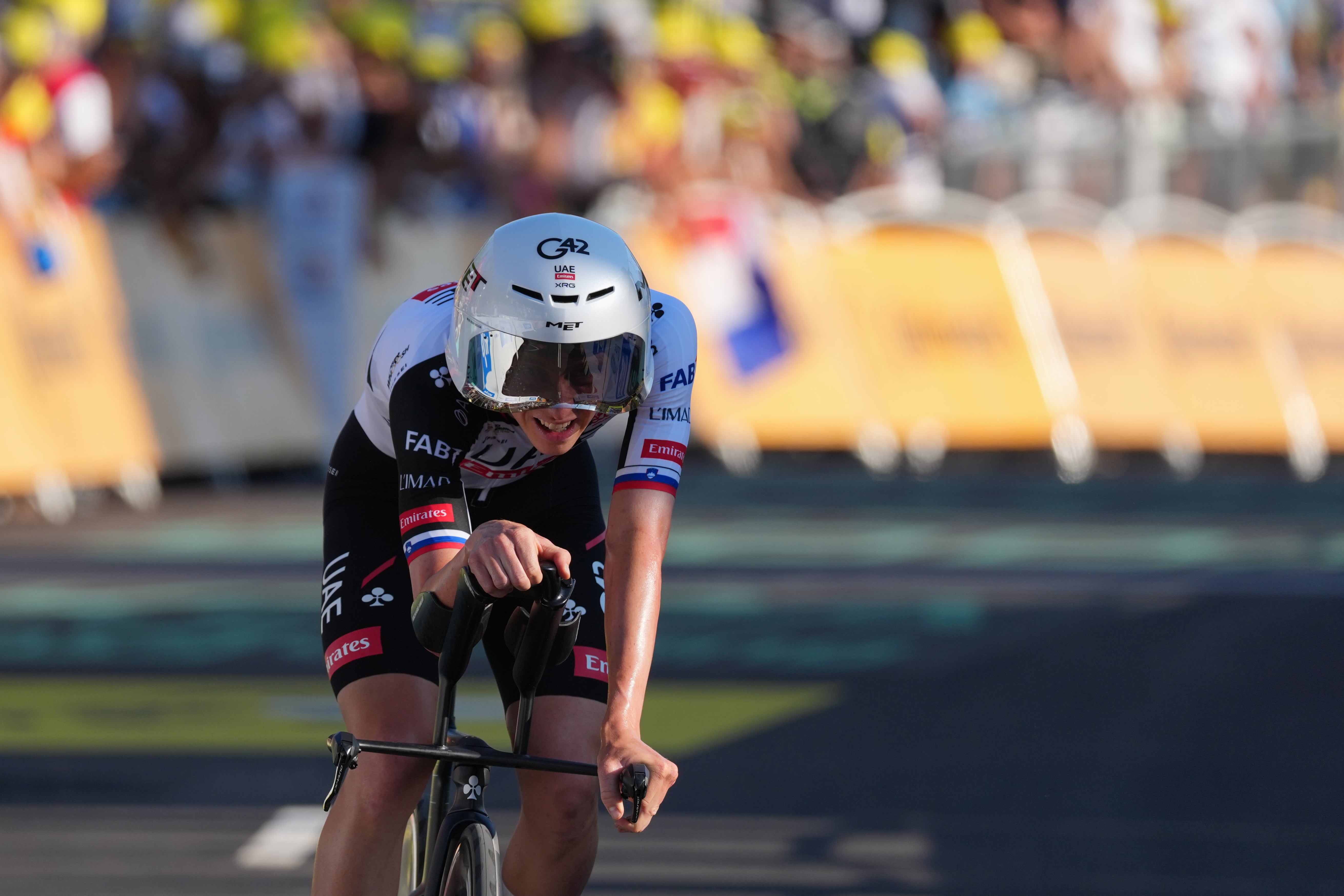 Slovenia's Tadej Pogacar of UAE Team Emirates XRG crosses the finish line of the first stage of the Tour de France