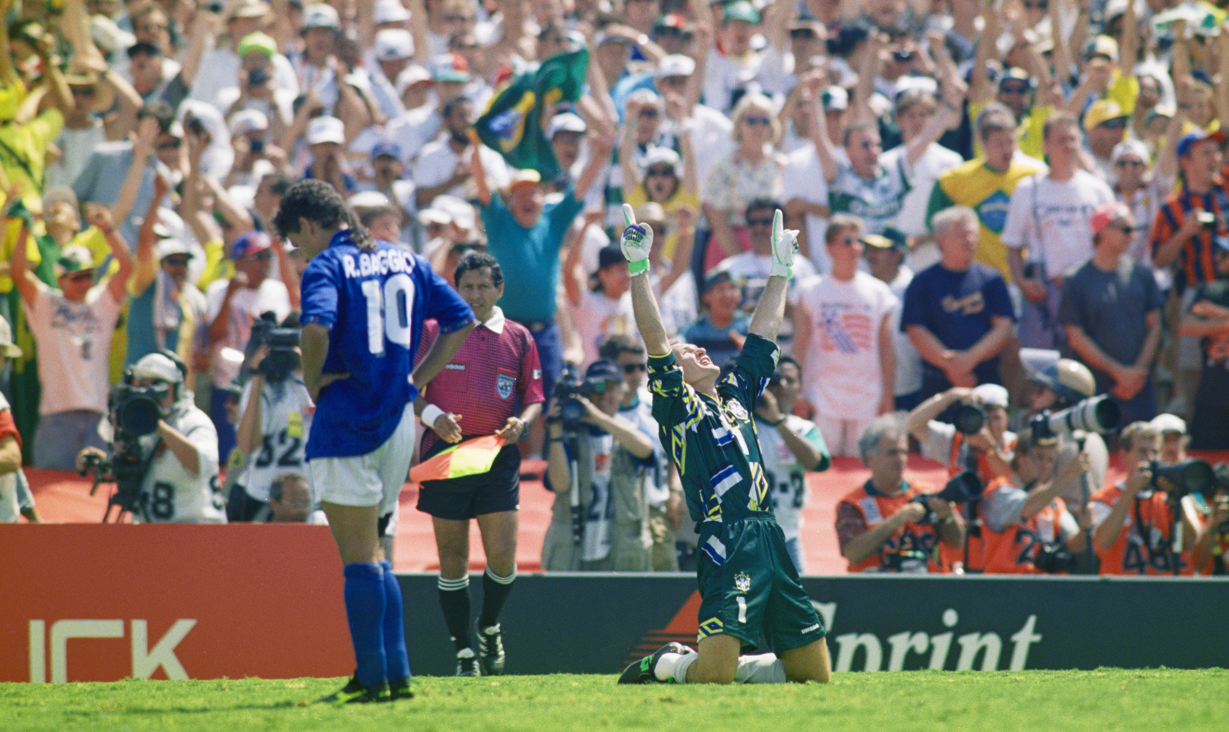 Brazil goalkeeper Claudio Taffarel celebrates after Roberto Baggio of Italy missed his penalty in the 1994 World Cup final