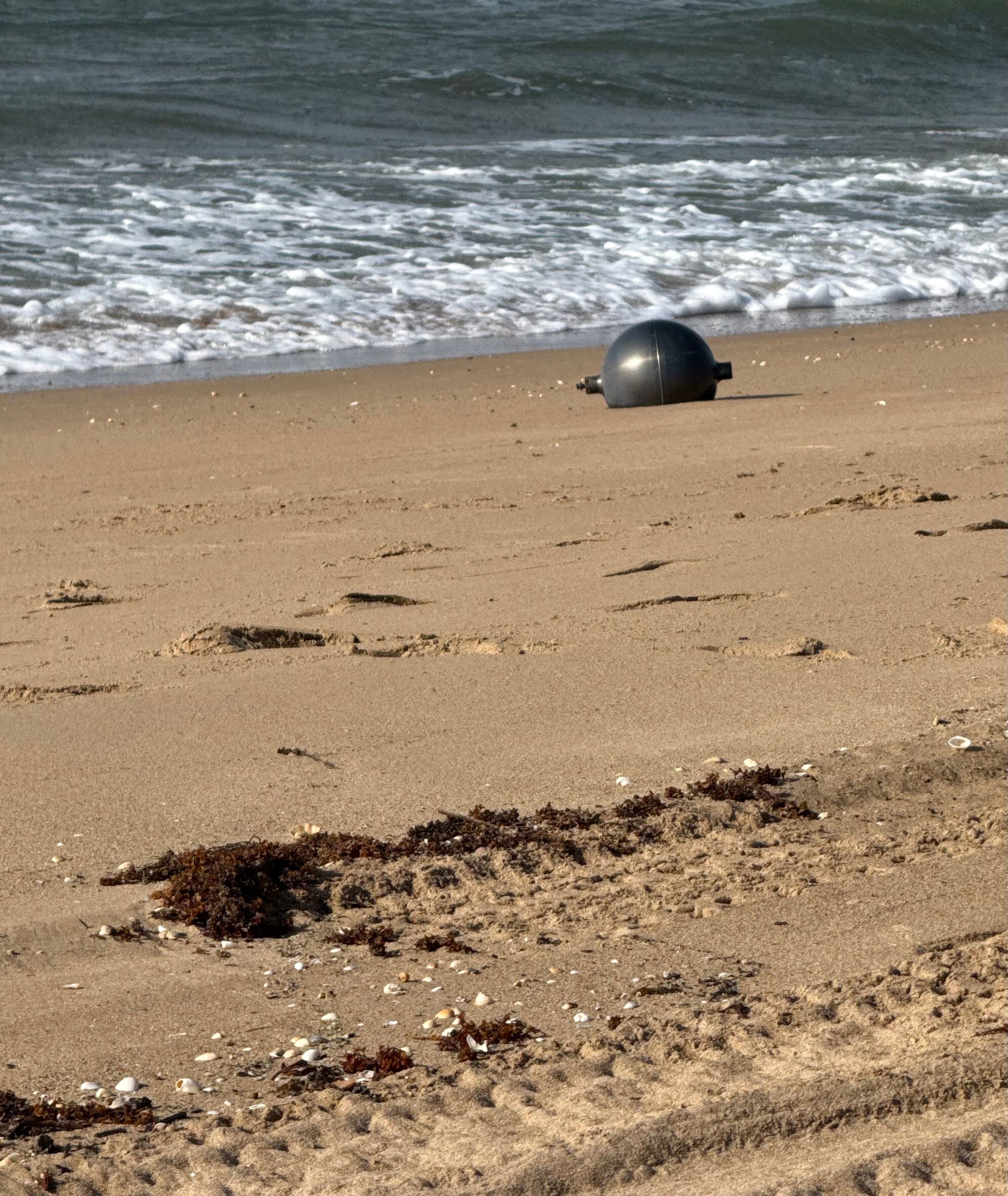 Strange balls found on Queensland beaches could be toxic &lsquo;space debris&rsquo;, experts warn