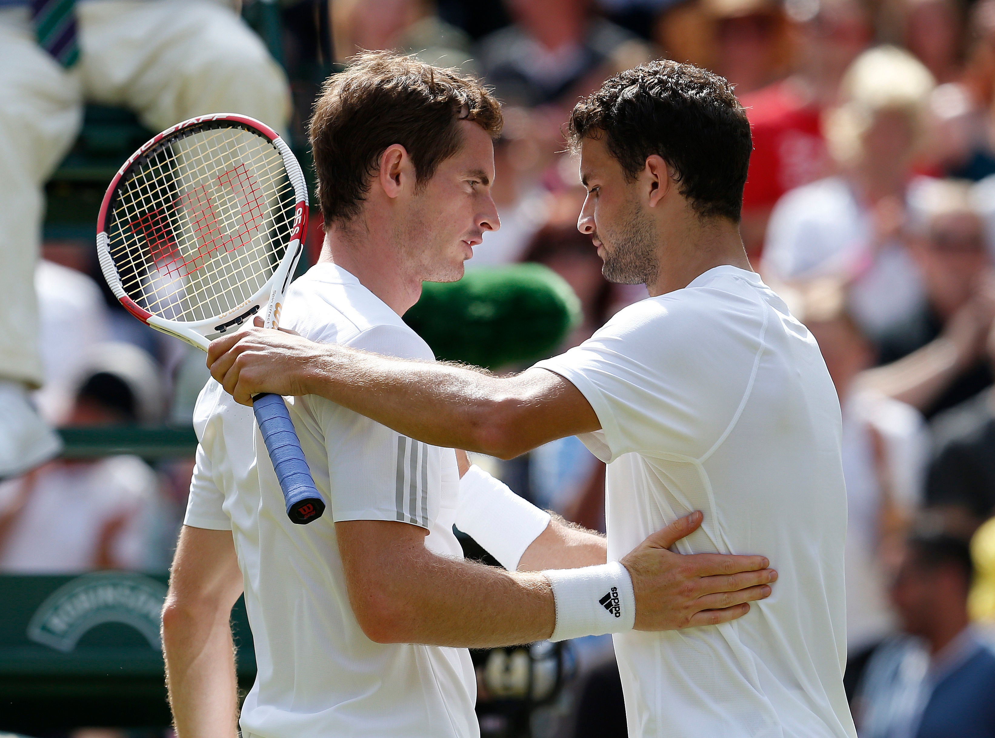 Grigor Dimitrov, right, beat reigning champion Andy Murray in 2014 (Jonathan Brady/PA)