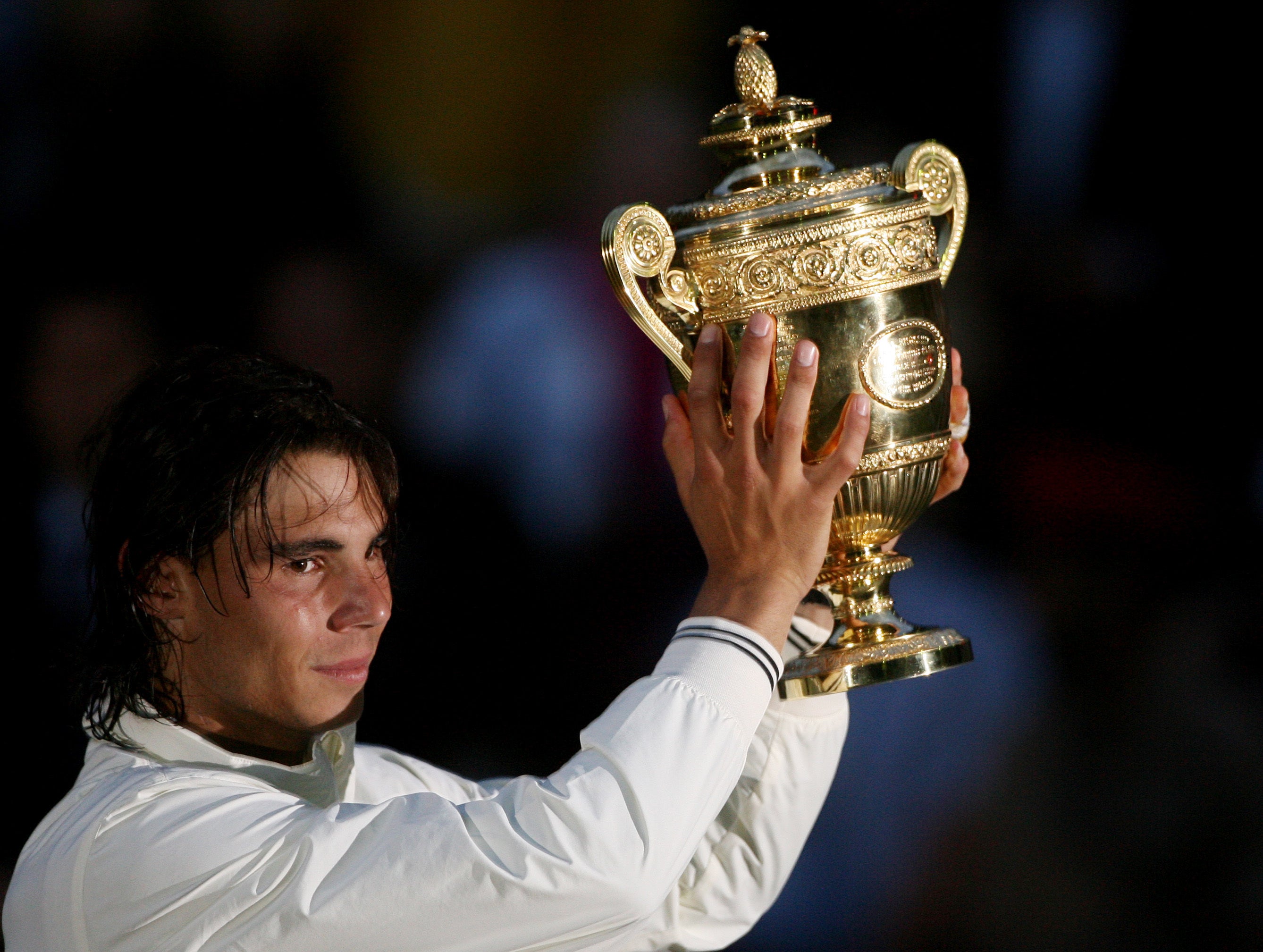 Rafael Nadal won the Wimbledon title for the first time with victory in the final over Roger Federer (Lewis Whyld/PA) (PA Archive)