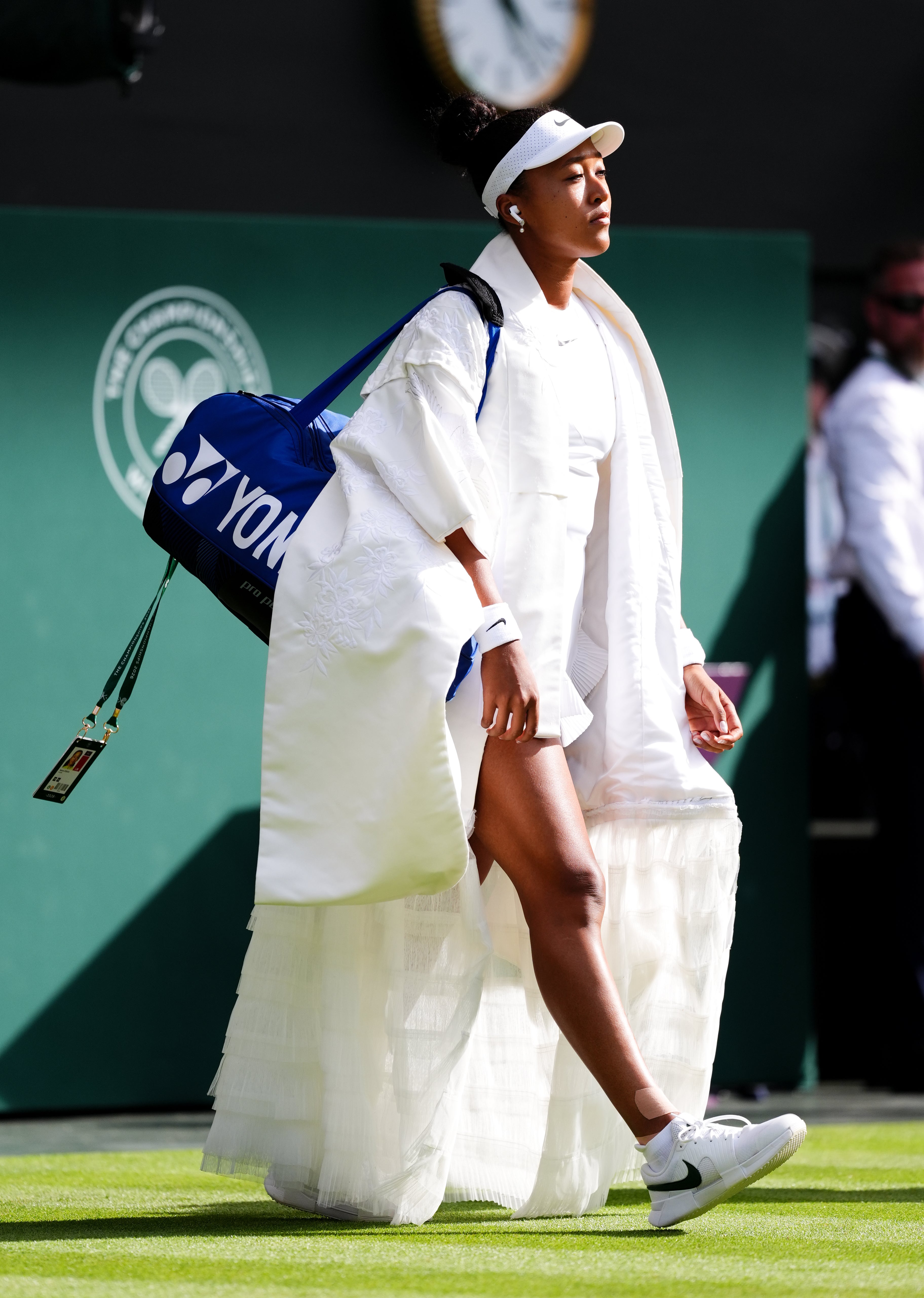 Naomi Osaka walks onto Centre Court (John Walton/PA) (PA Wire)