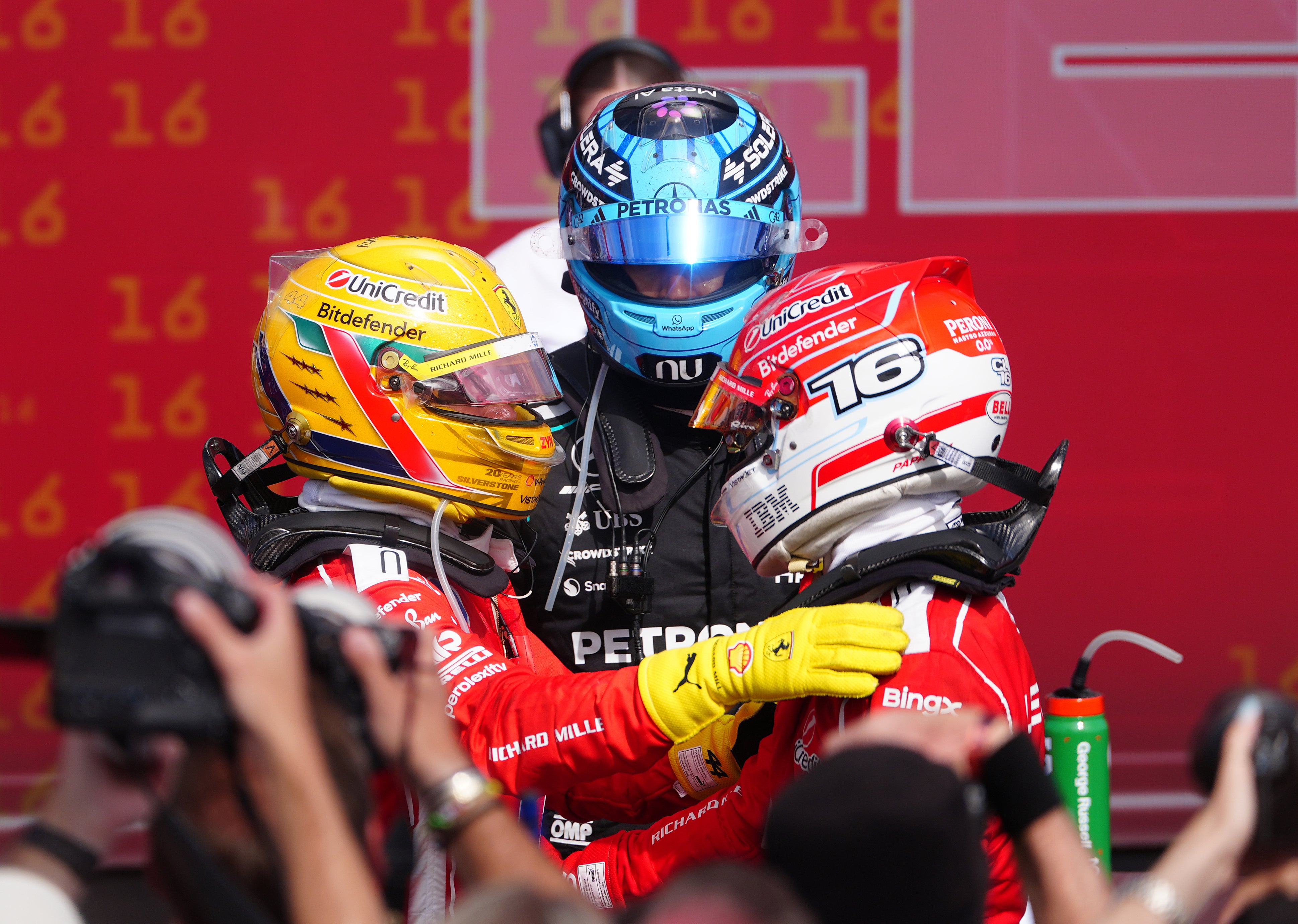 Lewis Hamilton, George Russell and Charles Leclerc after the British Grand Prix (David Davies/PA)