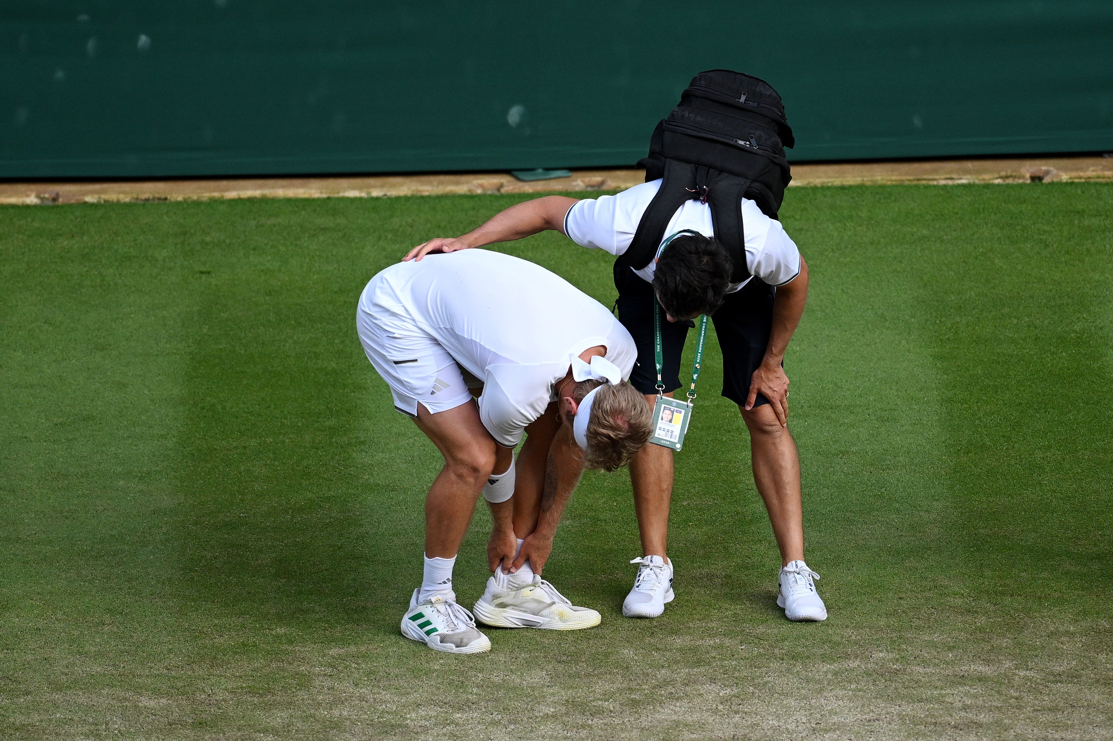 Alejandro Davidovich Fokina received medical attention after slipping and appearing to hurt his ankle