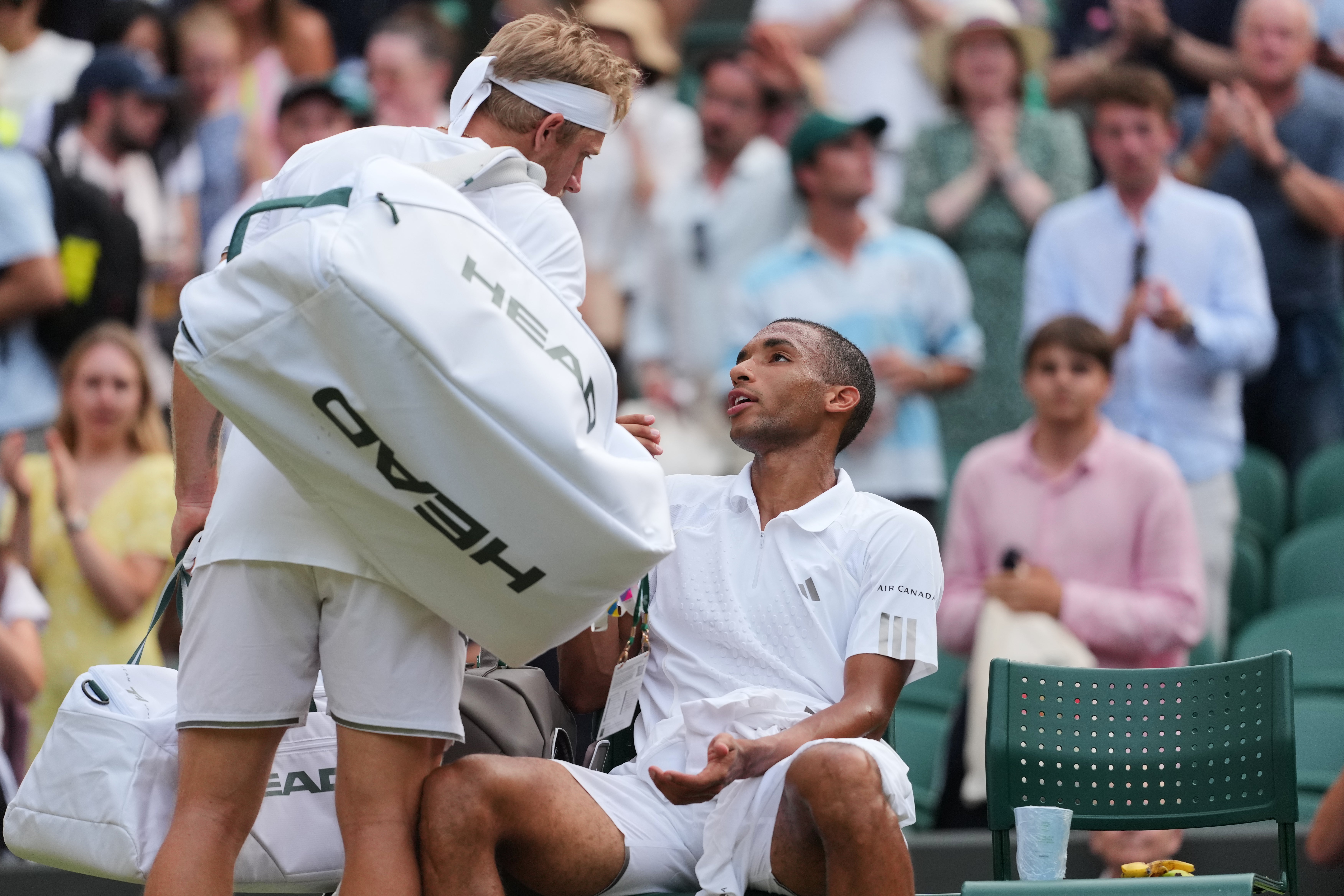 Felix Auger-Aliassime and Alejandro Davidovich Fokina argue after the men's singles fourth round match