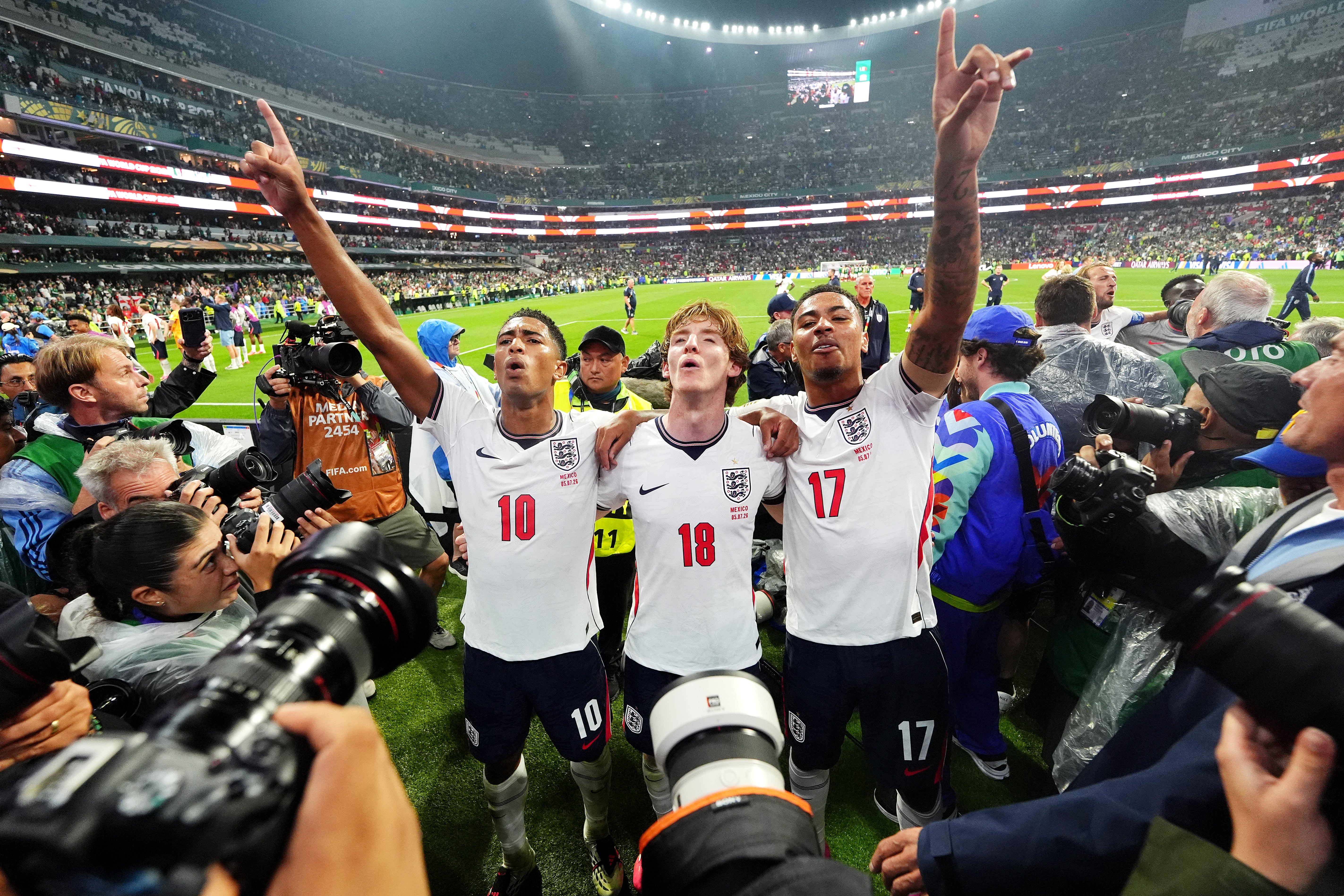 England's Jude Bellingham (left), Anthony Gordon and Morgan Rogers (right) celebrate
