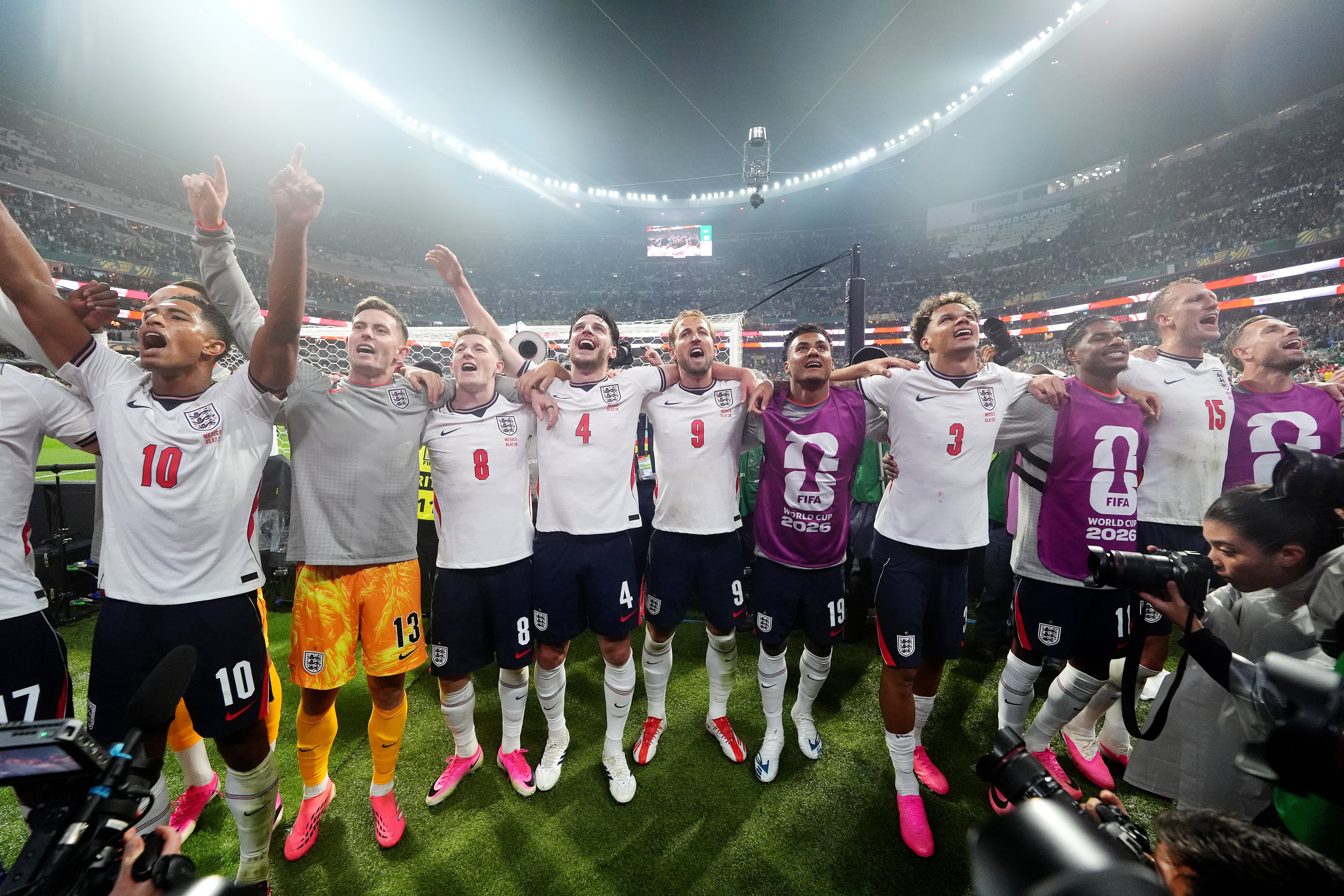England's Harry Kane (centre), Declan Rice (centre left), Jude Bellingham (left) and team-mates celebrate