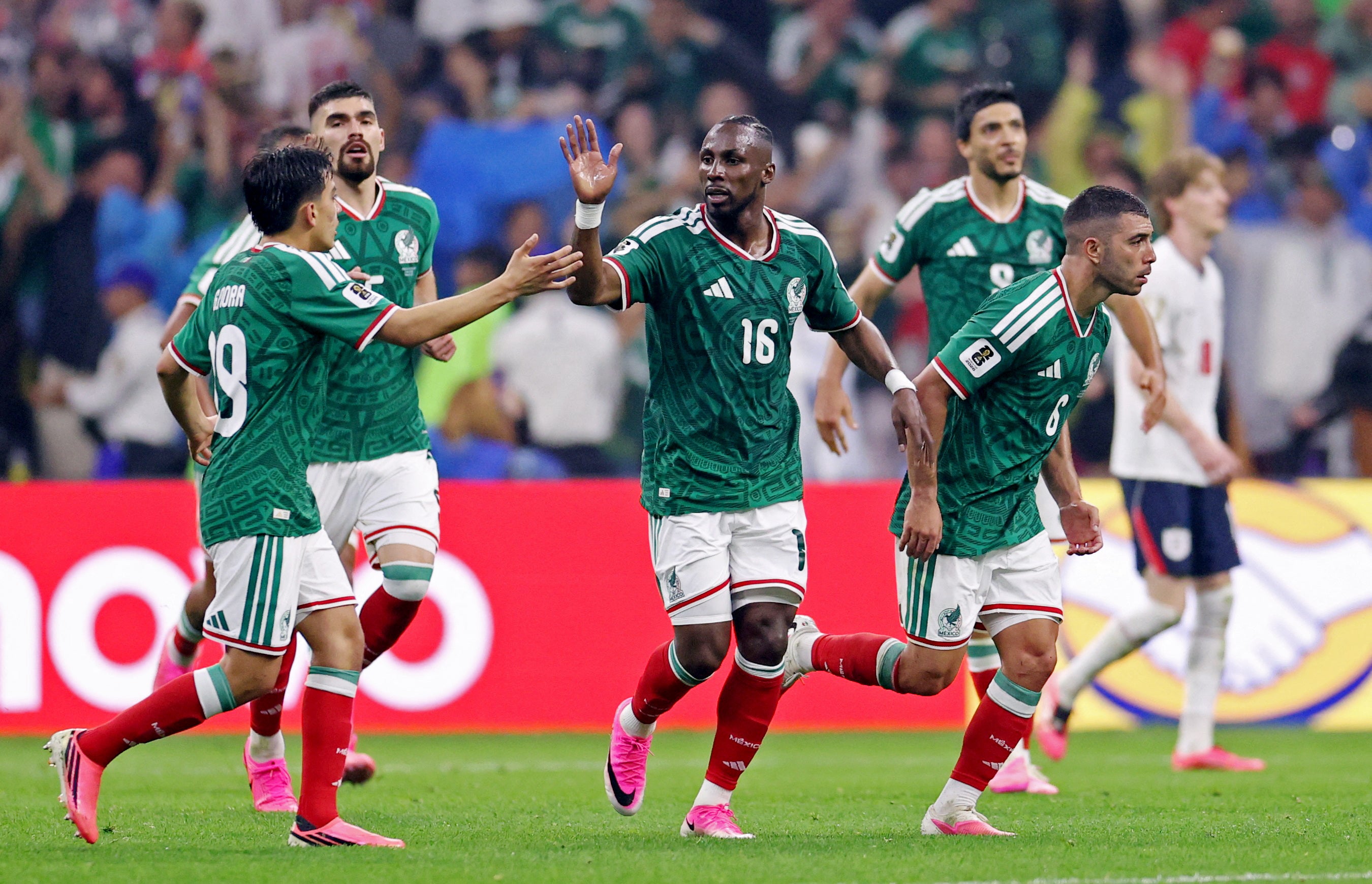 Mexico's Julian Quinones celebrates scoring their first goal with teammates