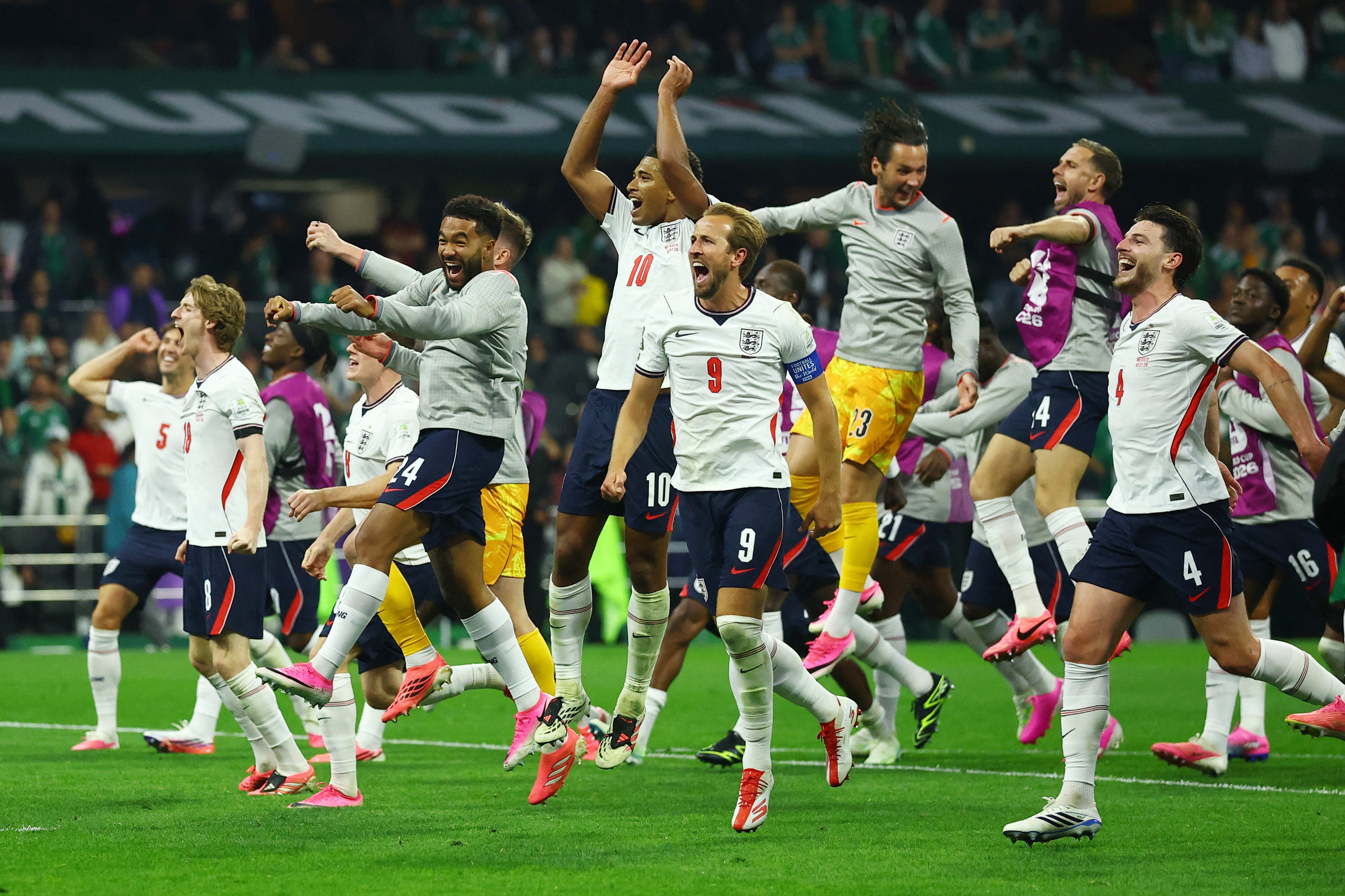 England's Harry Kane and teammates celebrate after the match (Reuters)