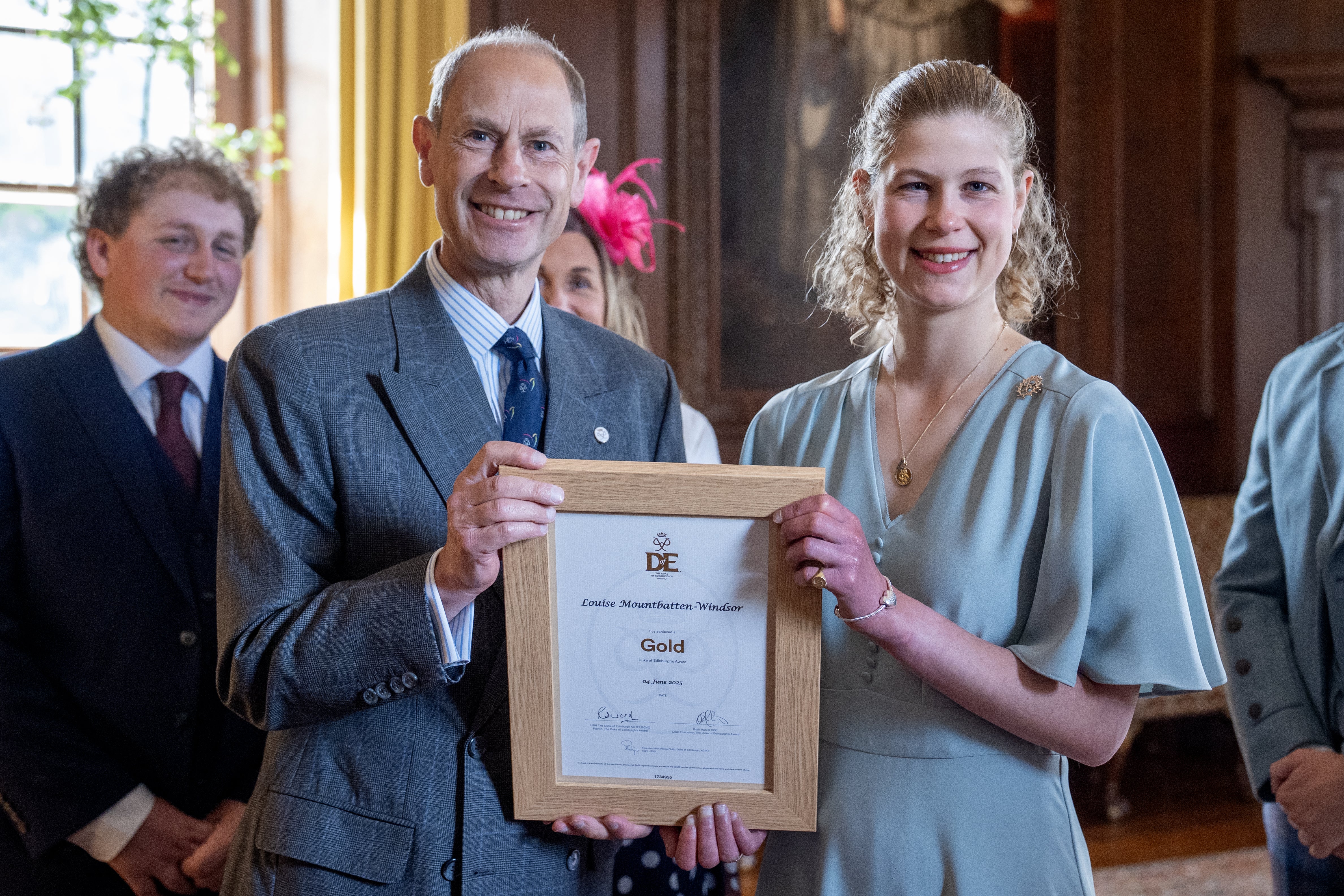 Prince Edward, Duke of Edinburgh presents his daughter Lady Louise Mountbatten-Windsor with the Duke of Edinburgh's Award Gold Award