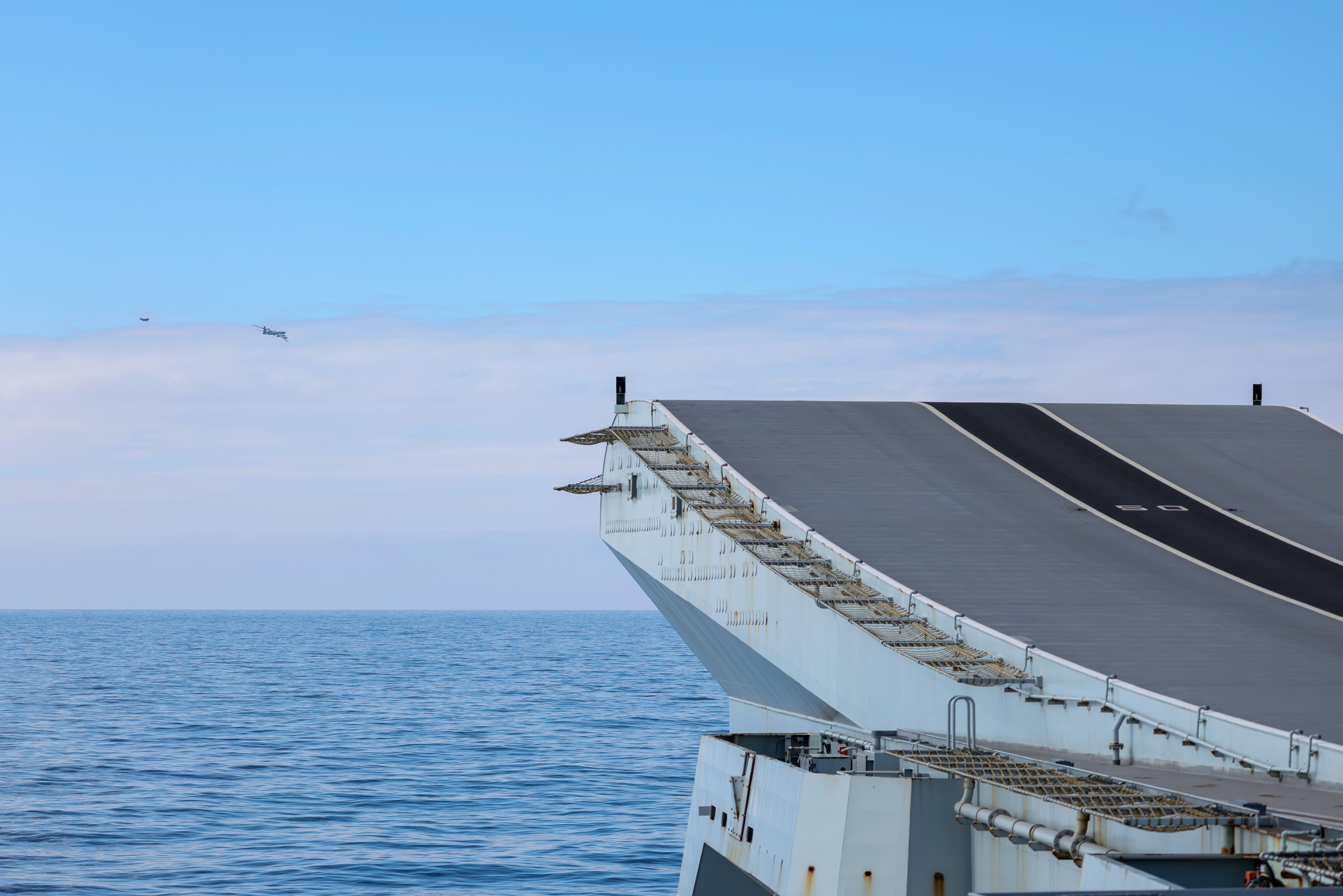 Two F-35 jets flew from the Prince of Wales to escort the Bear-F away from the Carrier Strike Group (MoD/Crown Copyright)