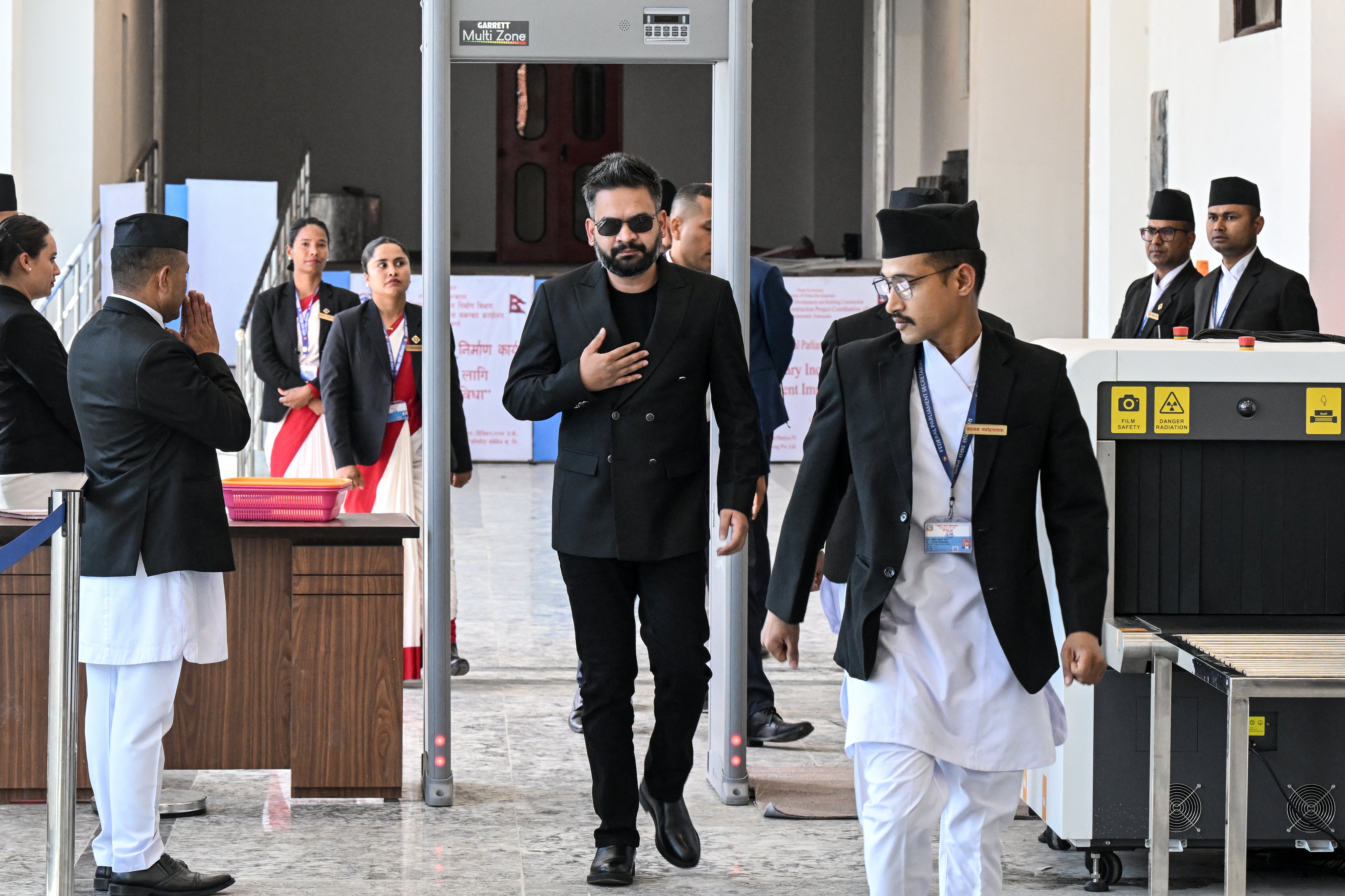 Balendra Shah, centre, arrives to attend a parliament session in Kathmandu on 2 April 2026 (AFP/Getty)