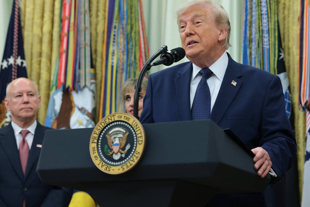 Trump is thanked for ‘getting rid of that ridiculous red card’ at Oval Office event