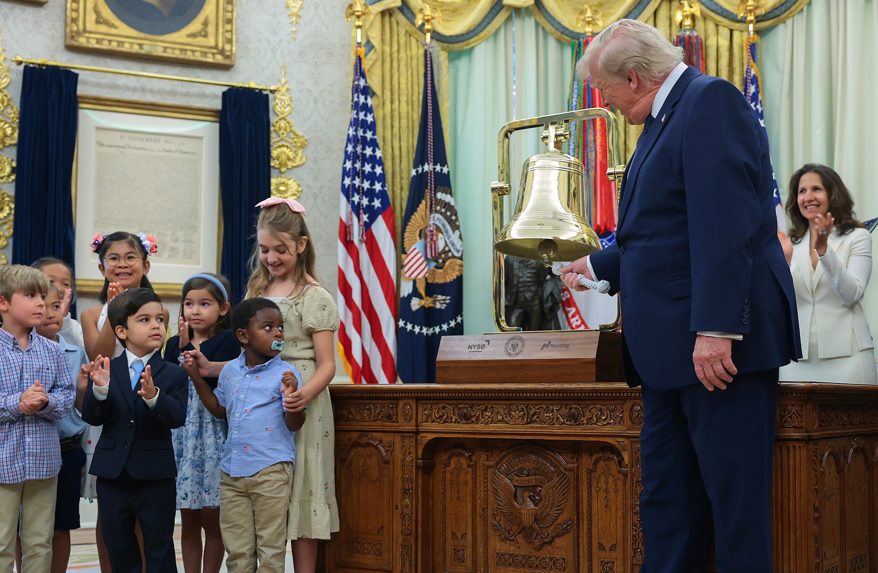 Donald Trump rings the opening bell for the stock market at the White House