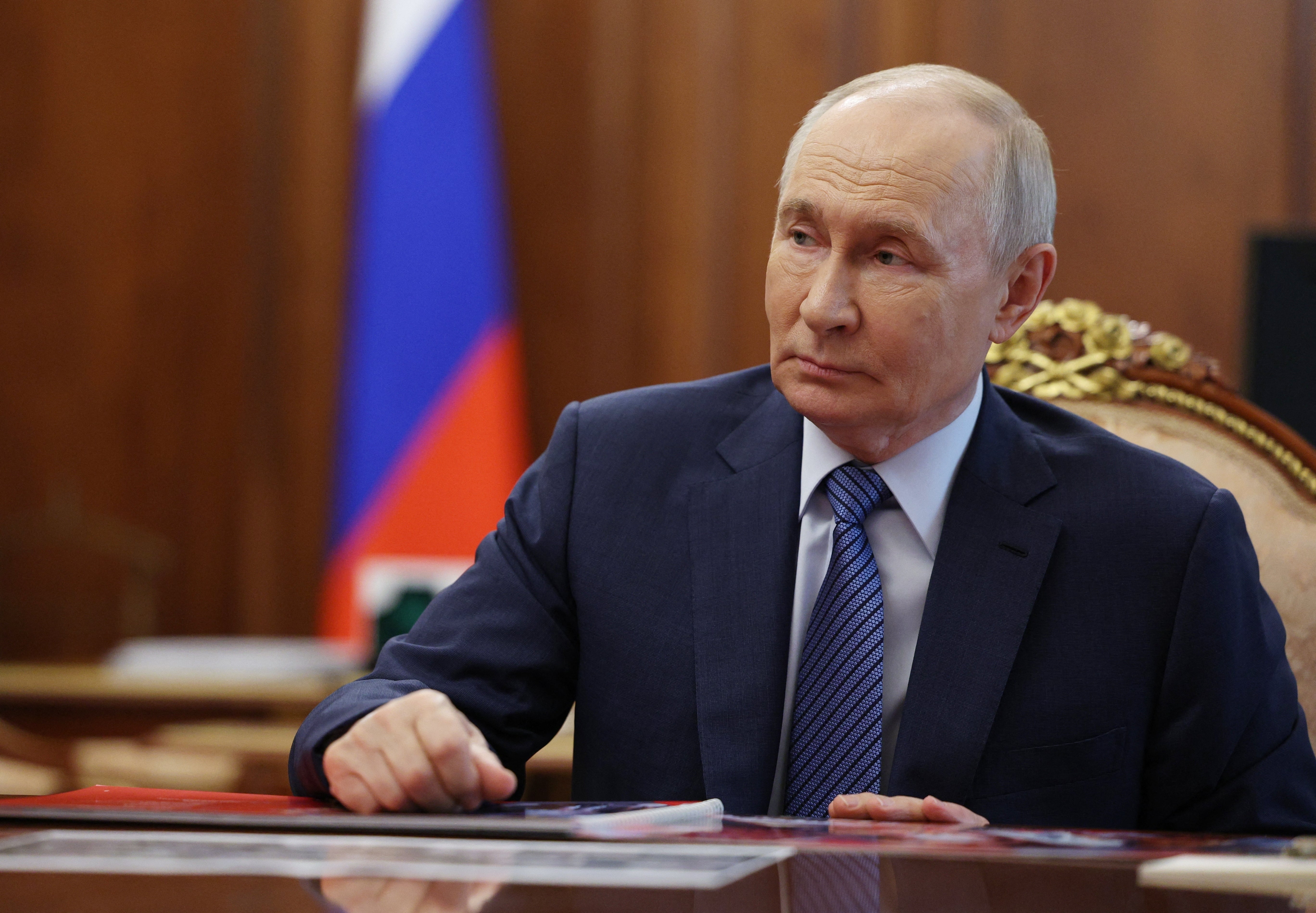 Russia's President Vladimir Putin attends a meeting with the Tula region governor in Moscow on July 6
