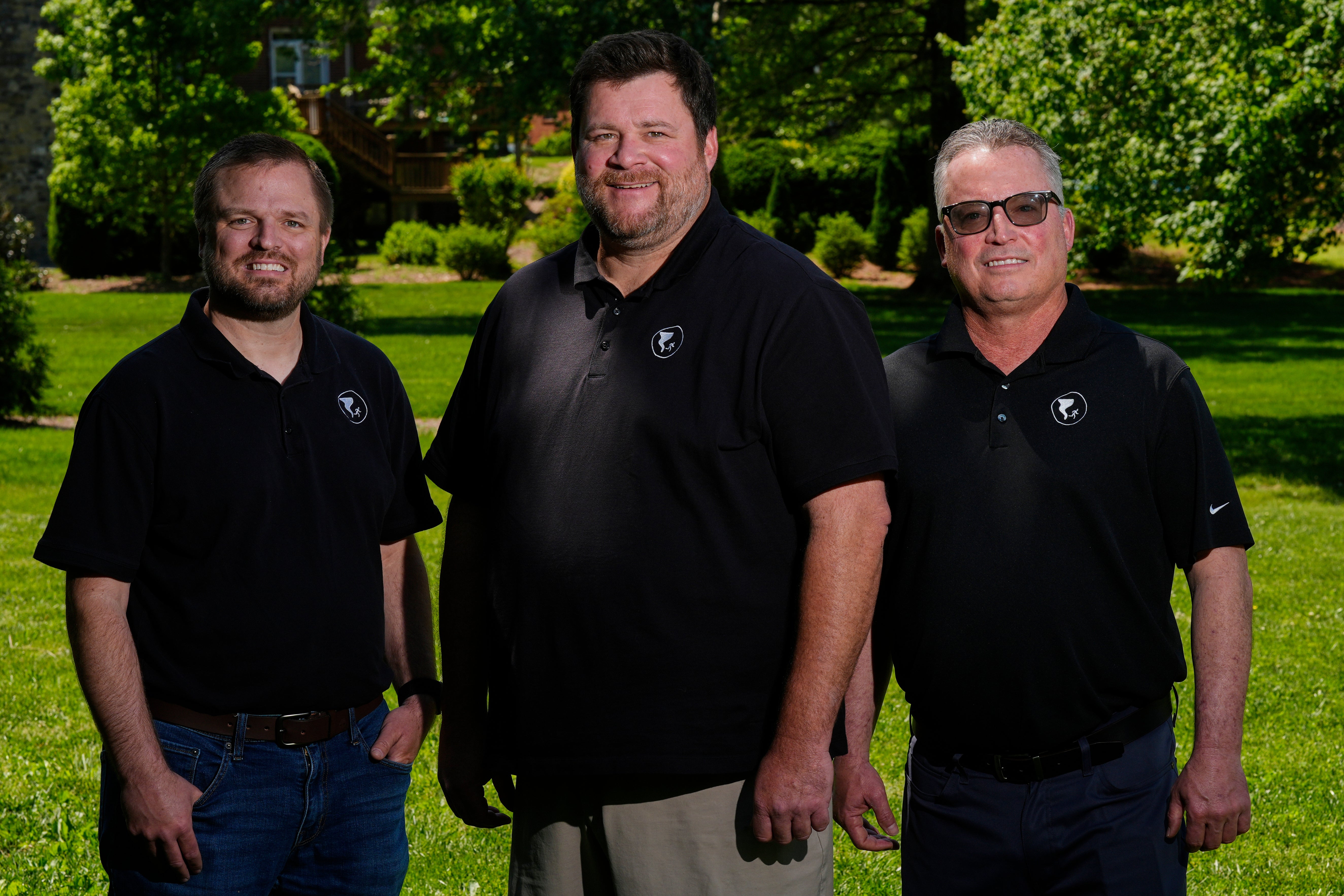 Andrew Leeper, left, Will Minkoff and Tom Johnstone, right, of Nashville Severe Weather, pose for a portrait