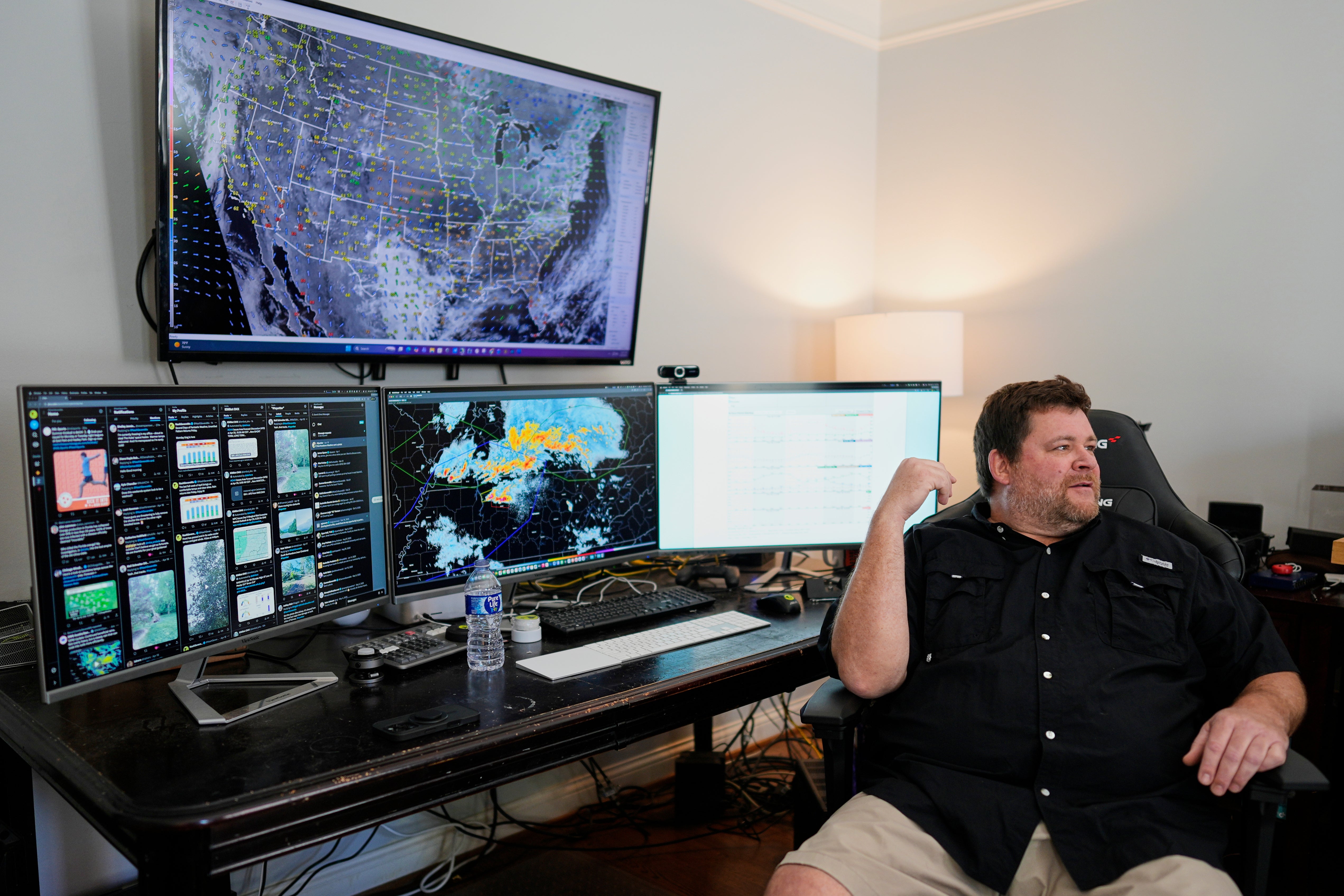 Will Minkoff of Nashville Severe Weather sits at his desk