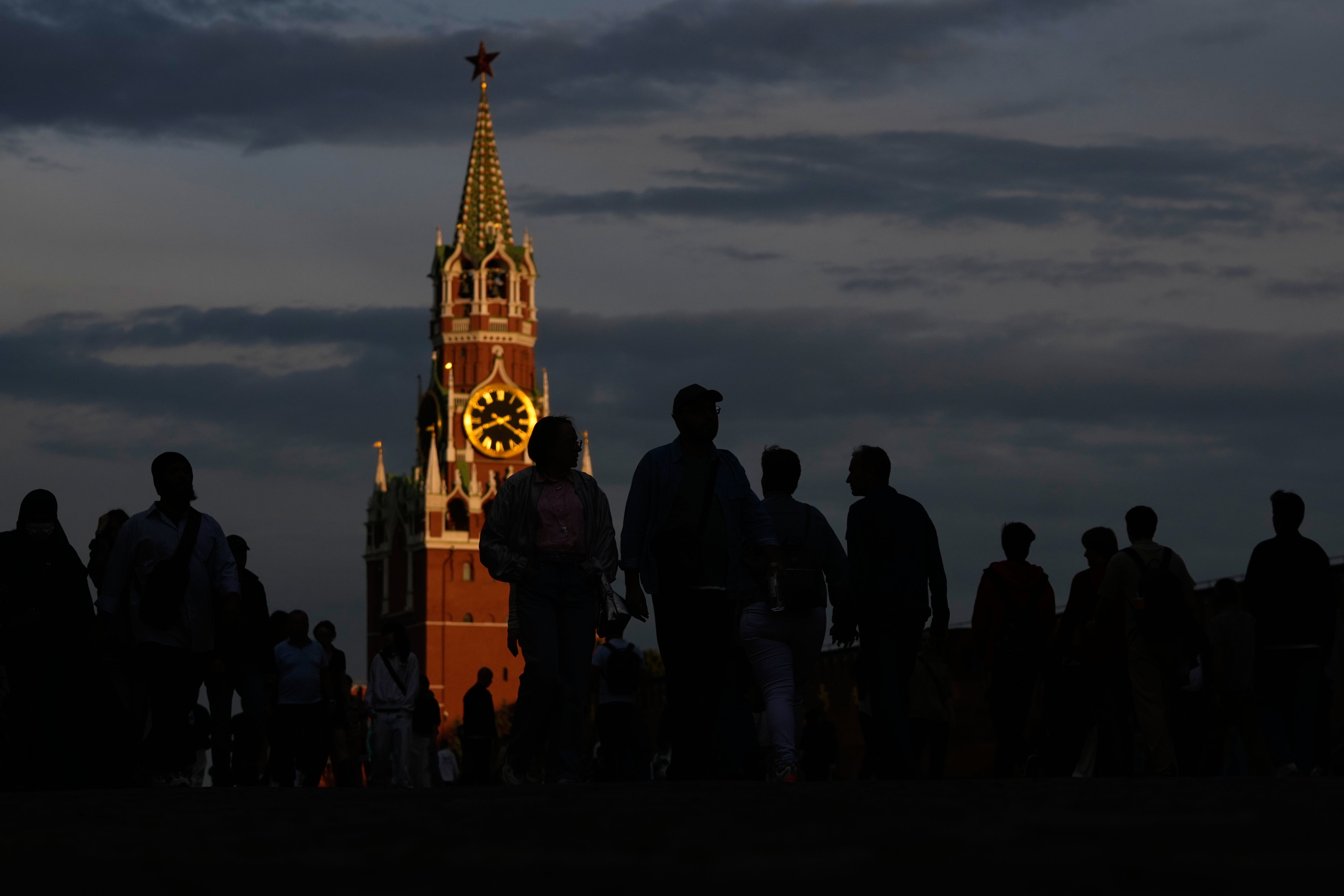 People walk through Red Square in Moscow (AP)
