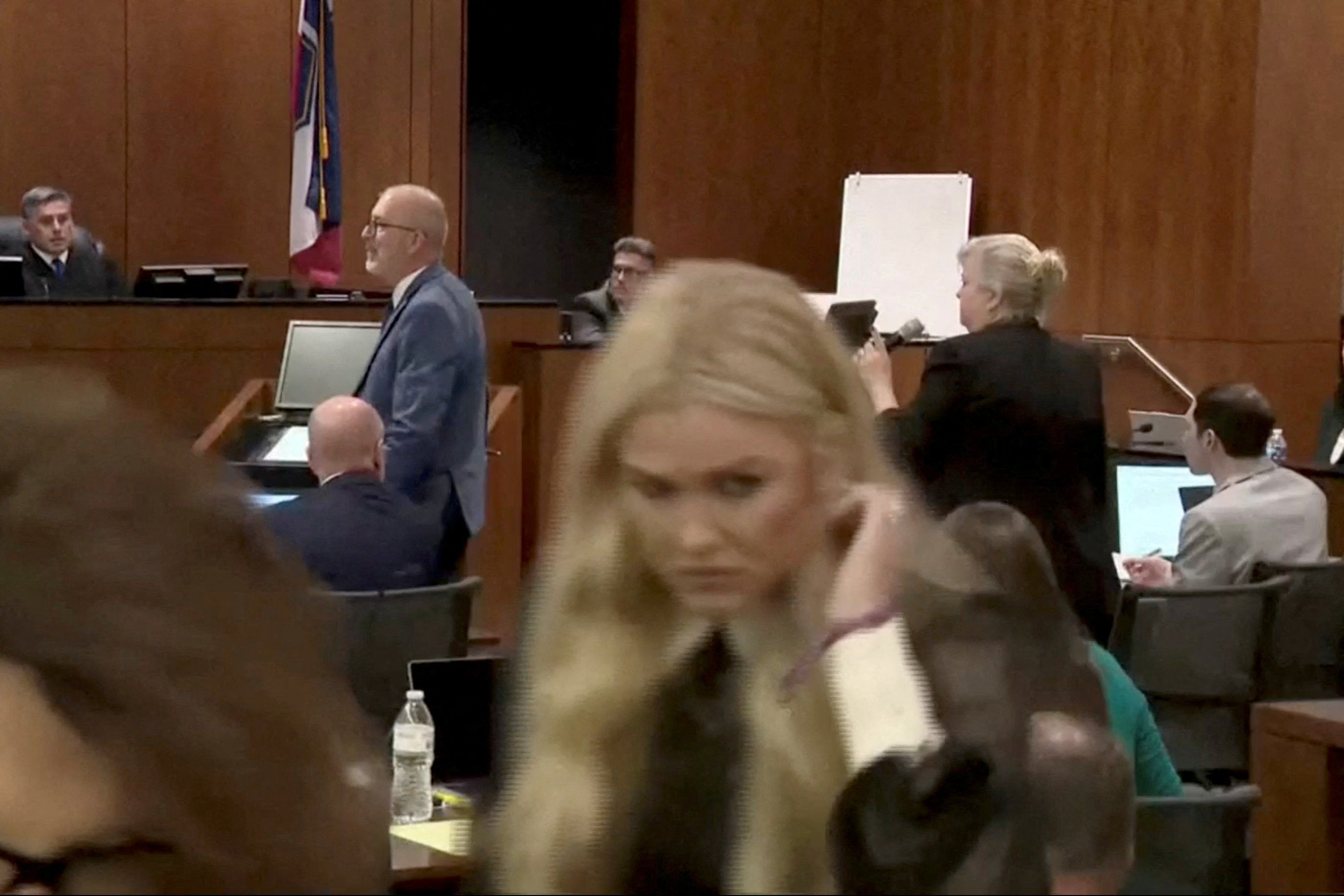Erika Kirk, widow of conservative activist Charlie Kirk, leaves during a preliminary court hearing for Tyler Robinson