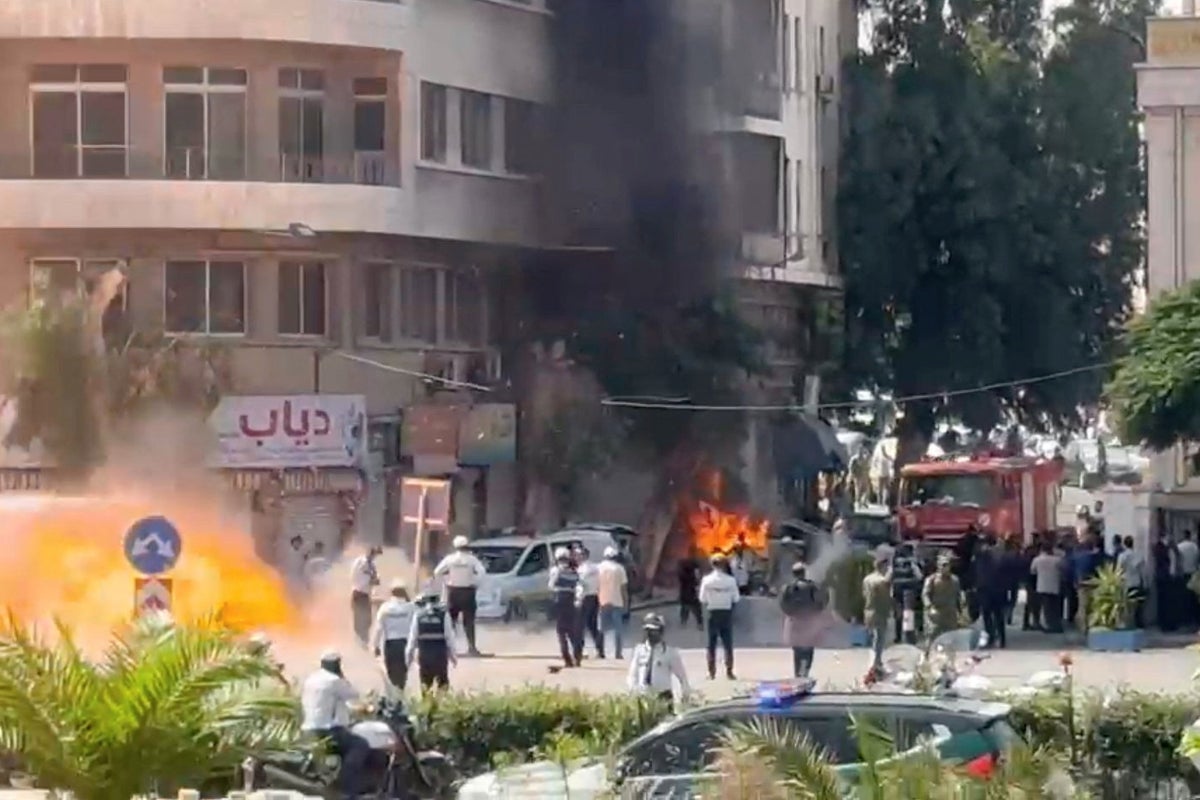 Explosive devices blow up near hotel where Macron is staying in Damascus