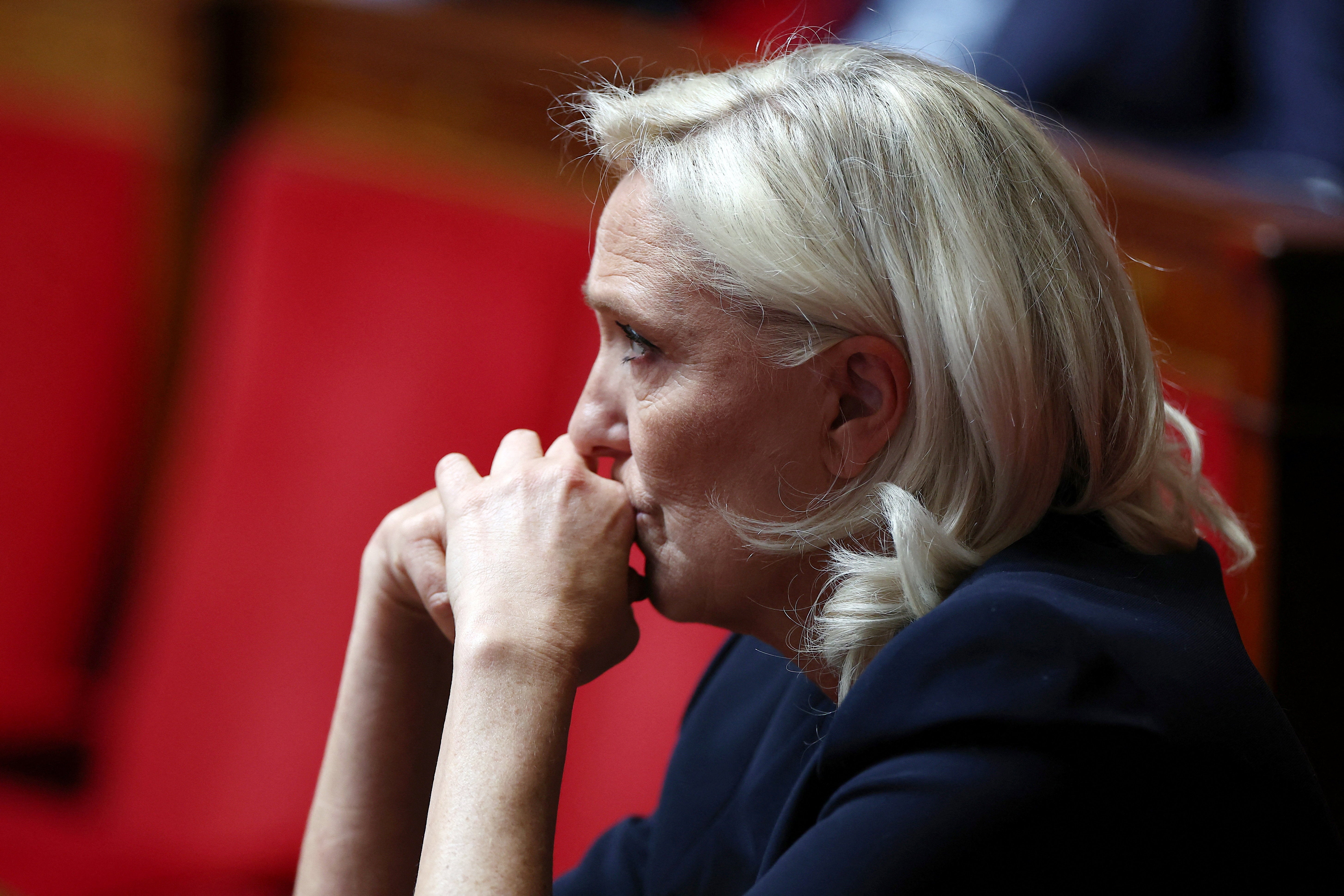 Marine Le Pen attends questions to the government session at the National Assembly in Paris, France.