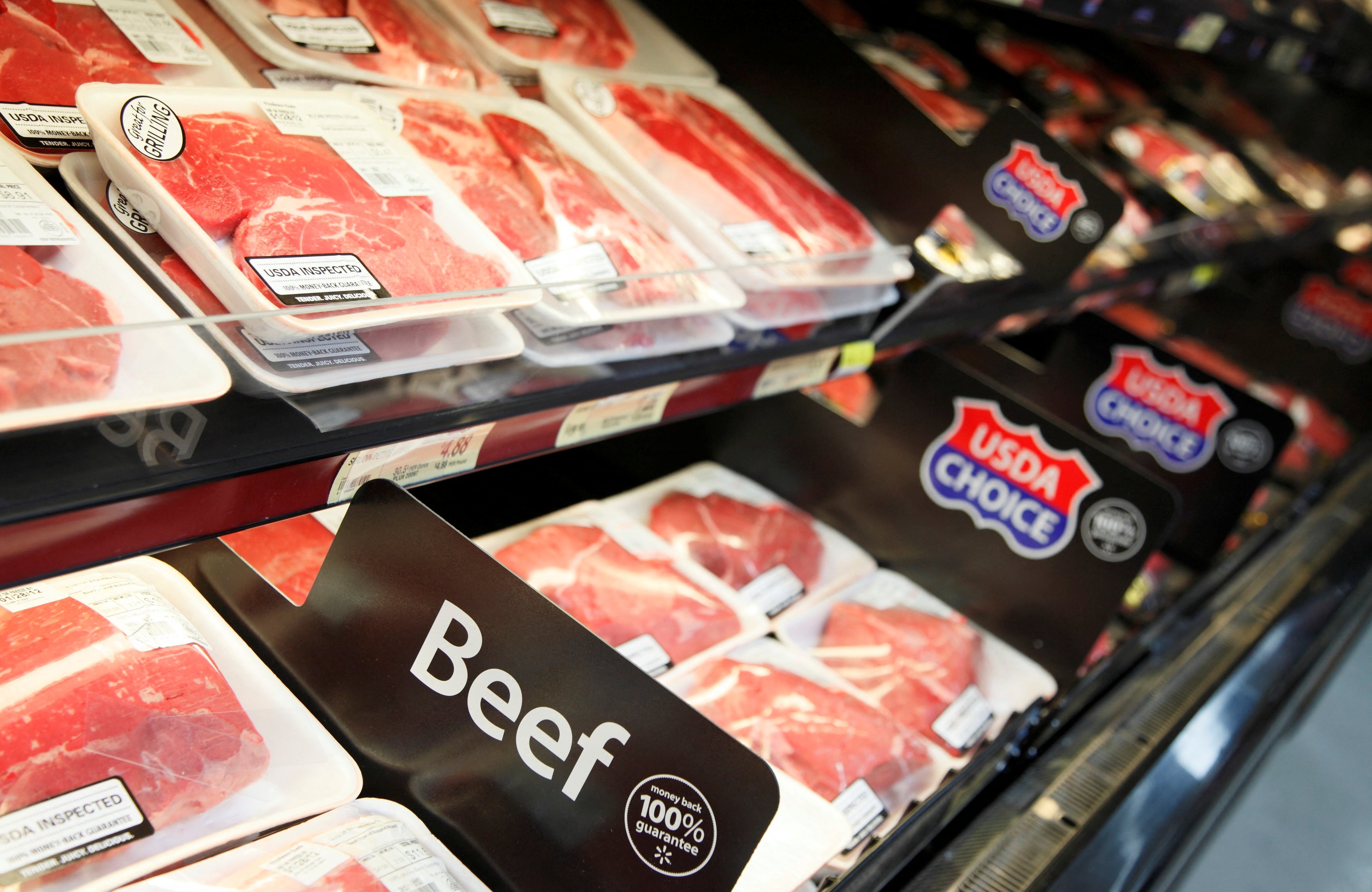 Walmart said on Monday it would cut prices on many summer barbecue favorites, ‌including meat, chips, and soda