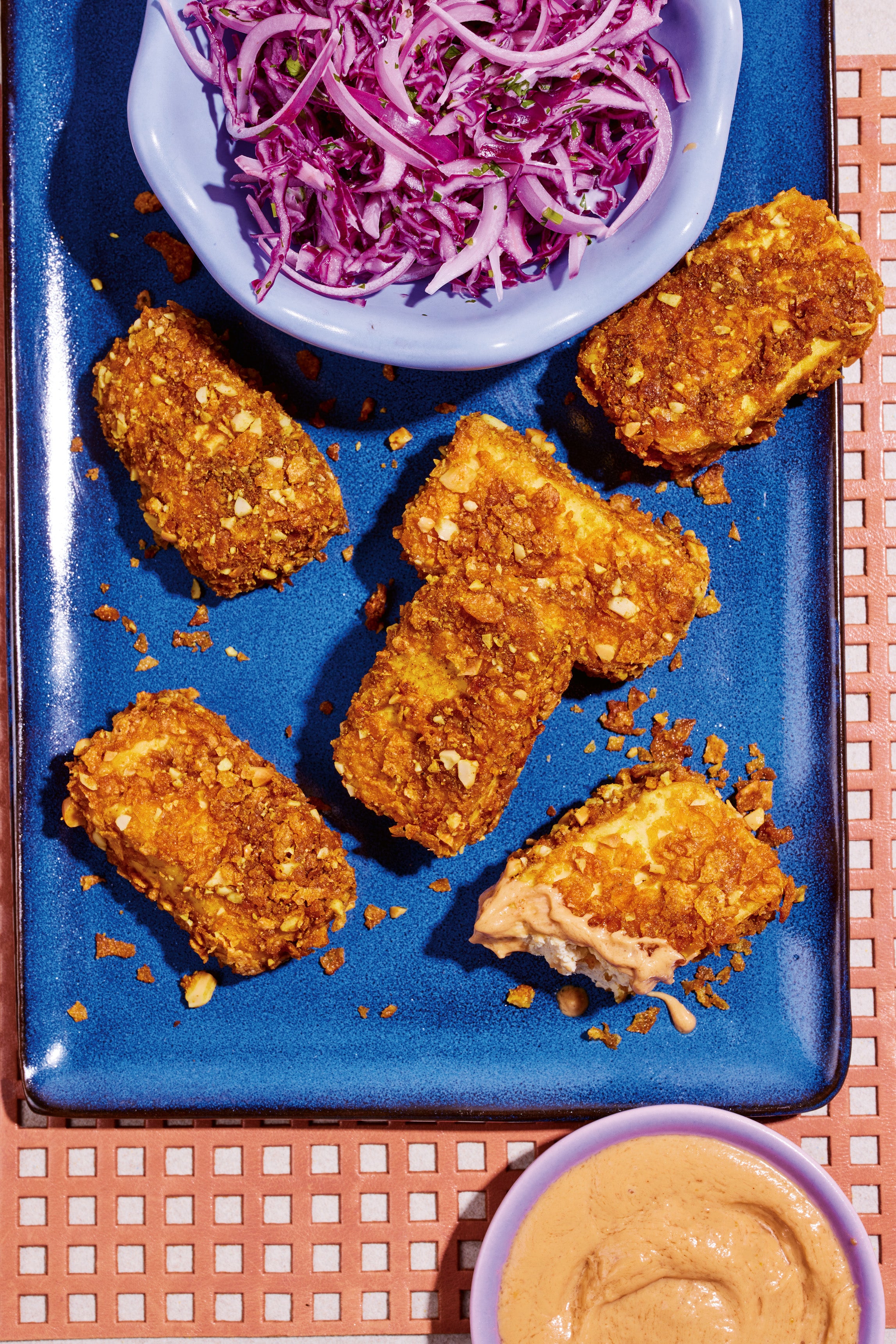 Crispy, satay-style tofu gets its crunch from peanuts and cornflakes