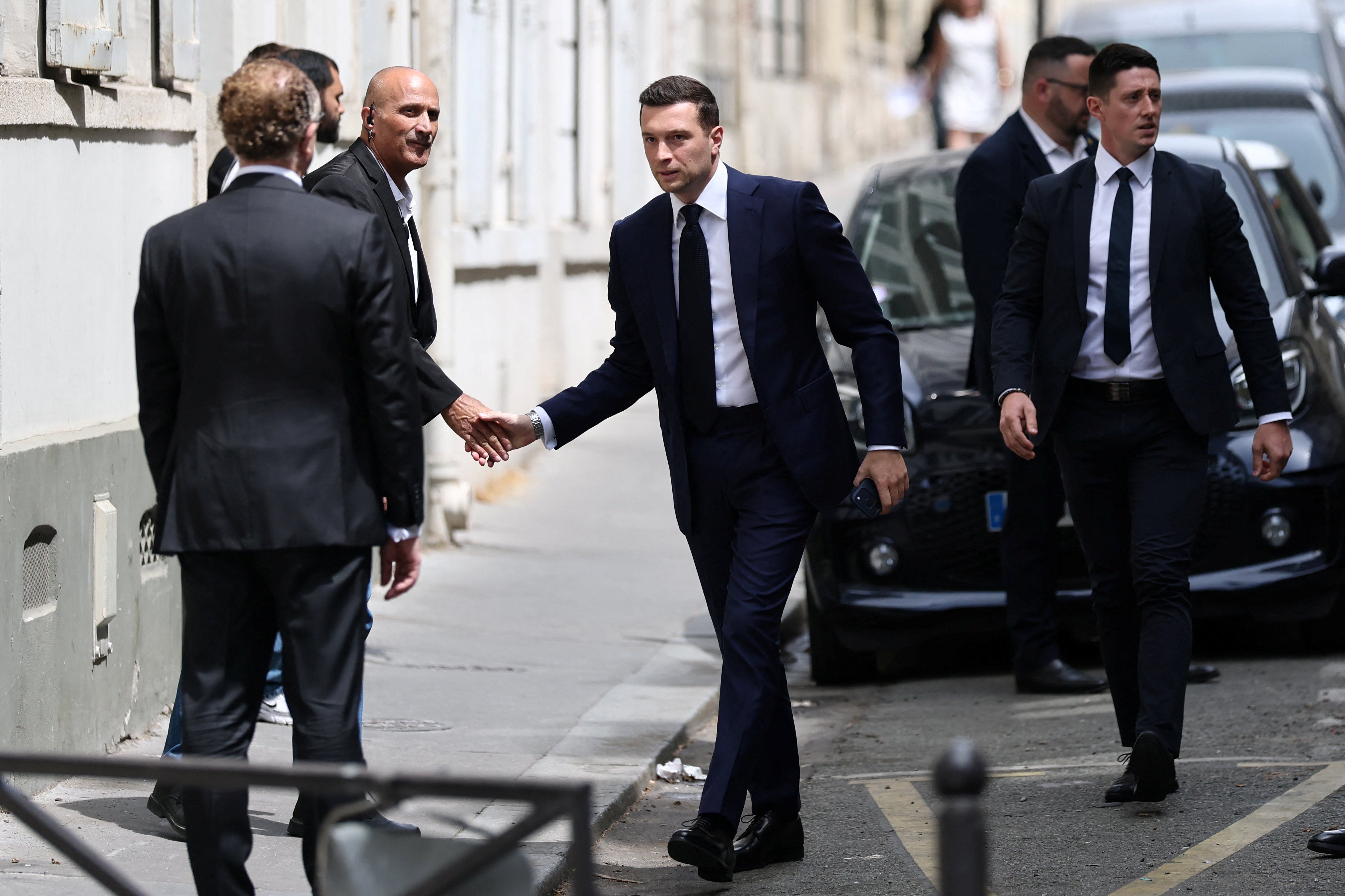 Jordan Bardella, president of the French far-right Rassemblement National (National Rally - RN) political party, arrives at the Rassemblement National headquarters