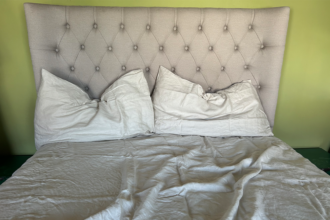 The linen has a natural, slightly crumpled texture and breathable feel (Ali Howard/The Independent)