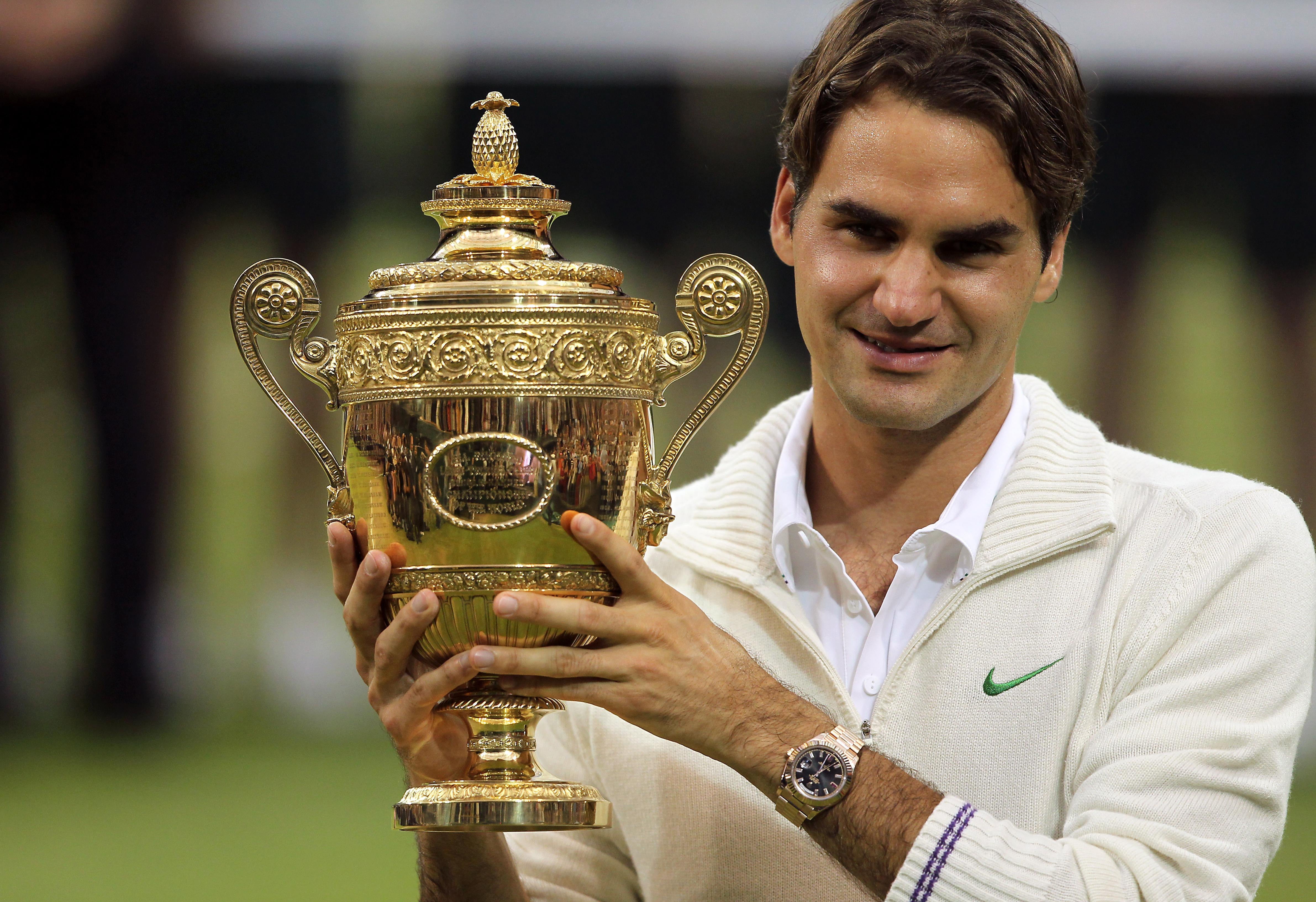 Federer won Wimbledon for a seventh time (Stephen Pond/AP) (PA Archive)