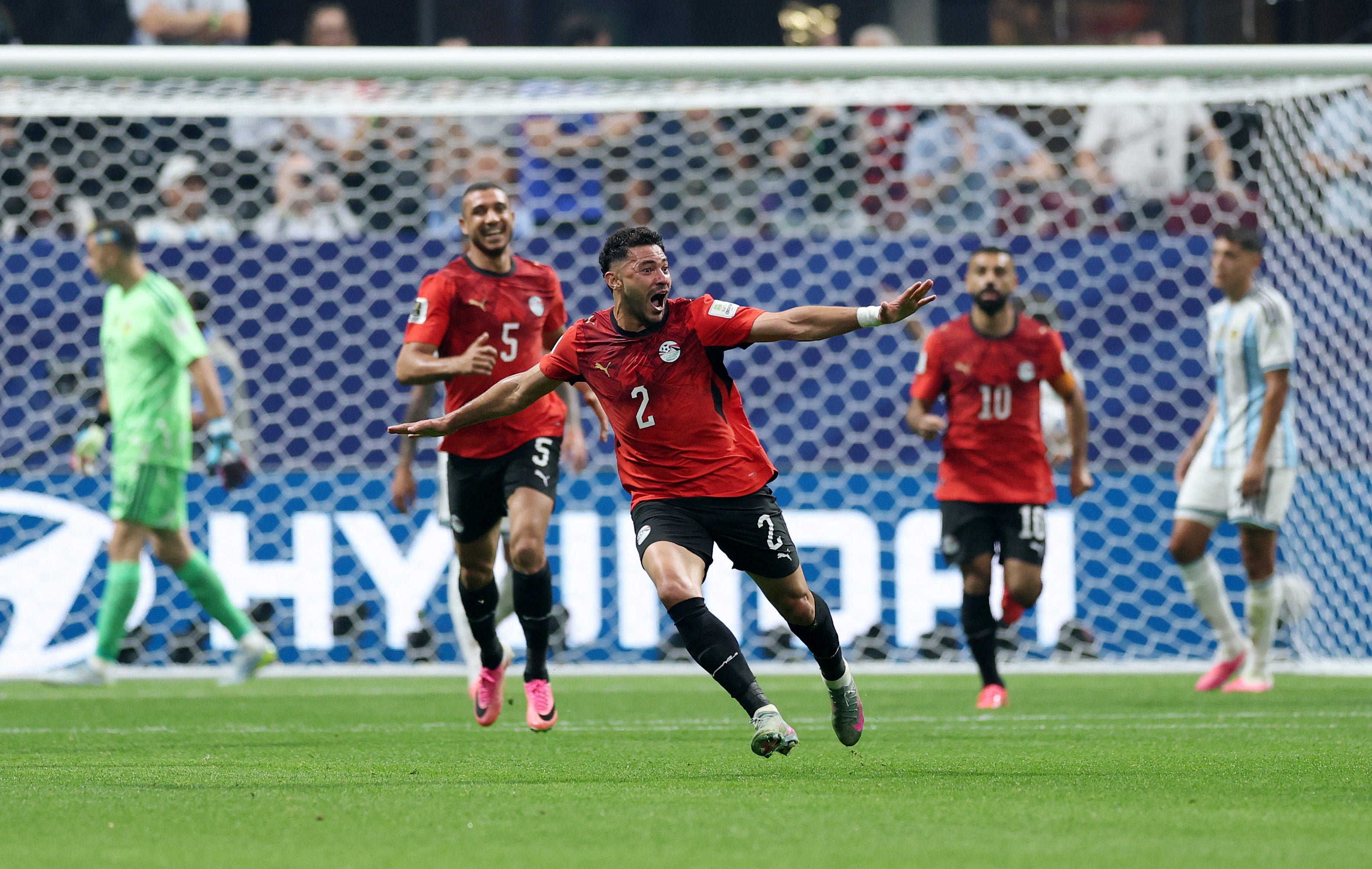 Egypt's Yasser Ibrahim celebrates scoring their first goal (Reuters)