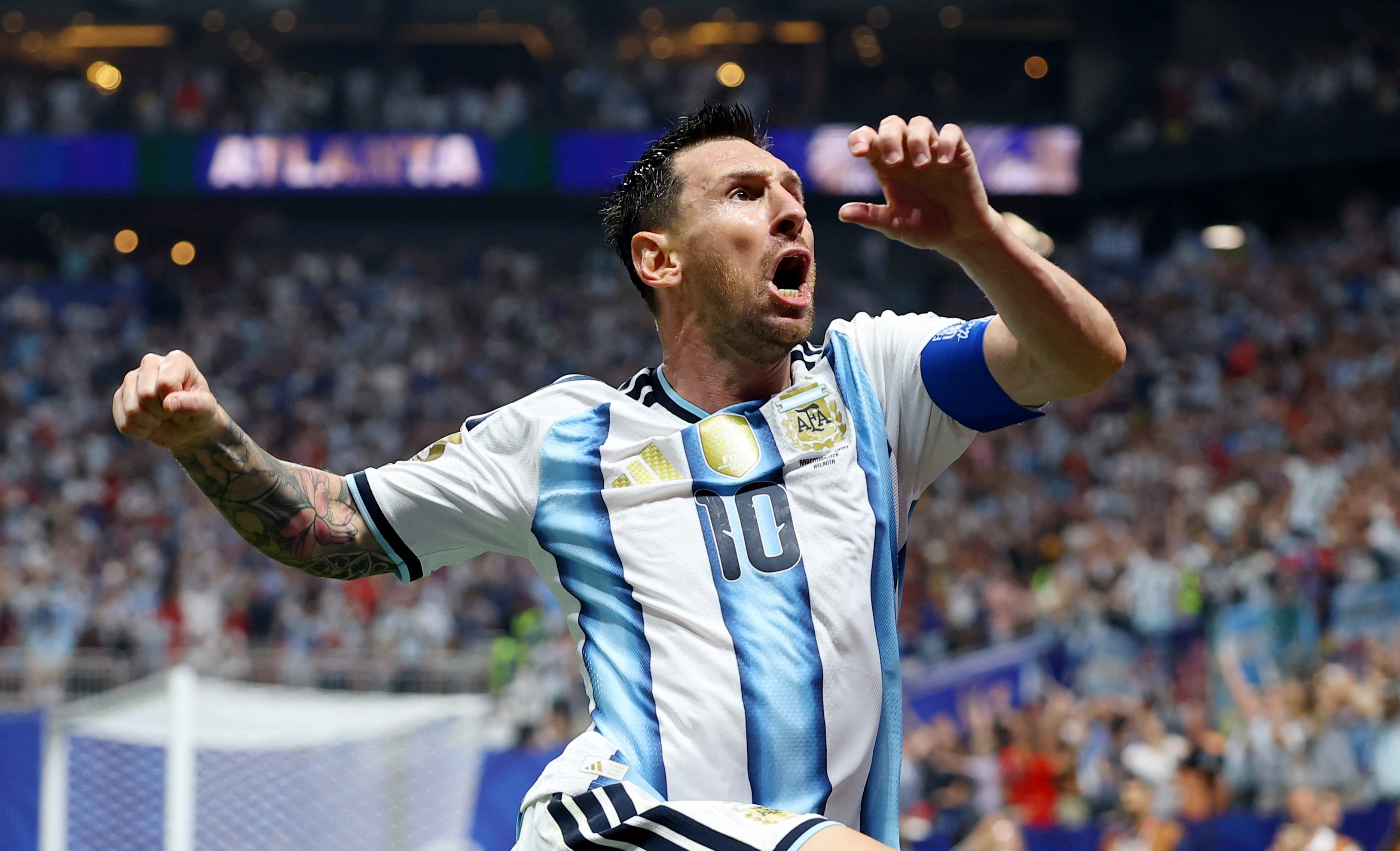 Argentina's Lionel Messi celebrates scoring their second goal