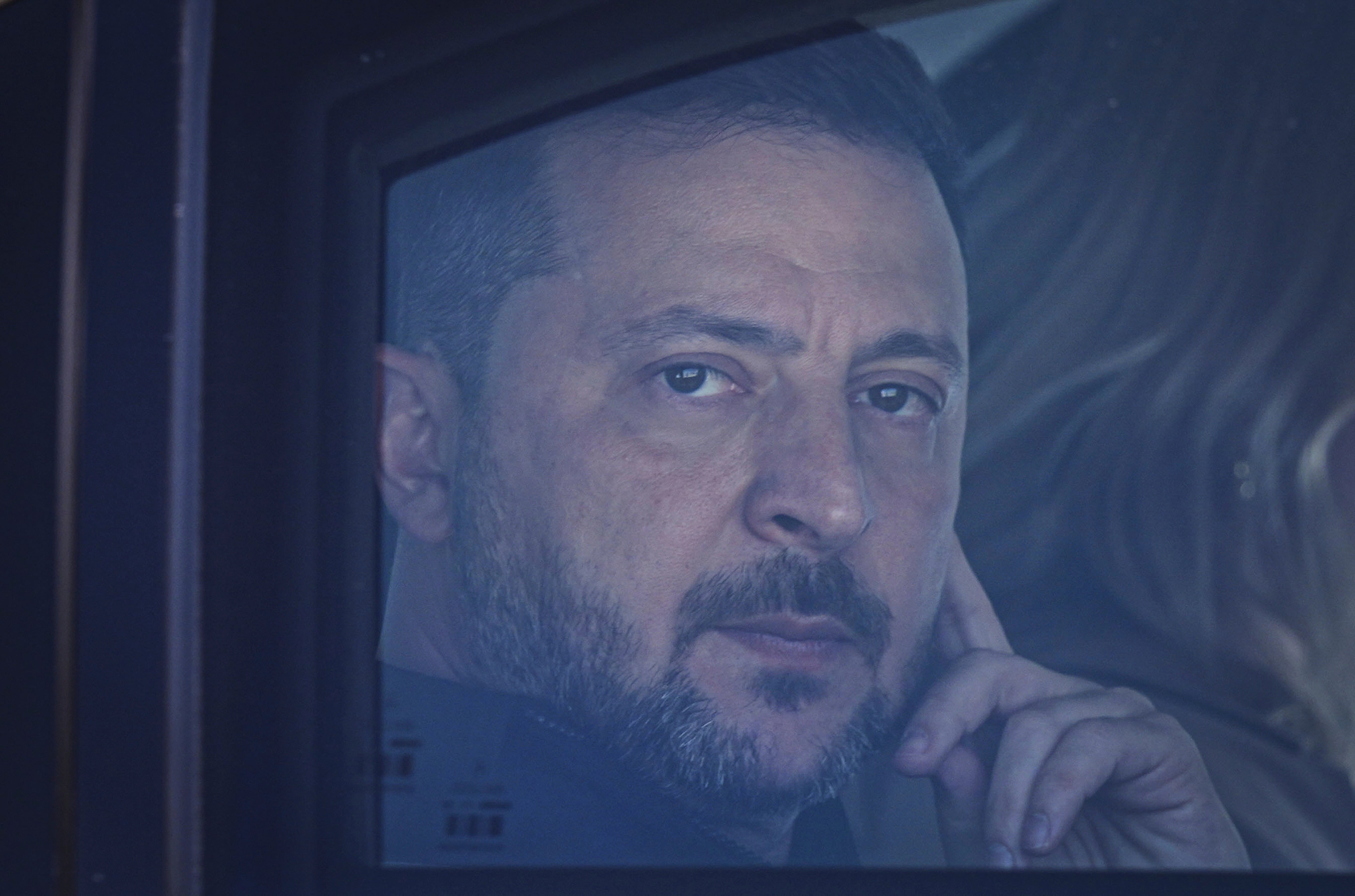 Ukraine's president Volodymyr Zelensky looks out from his car window as he arrives for the Nato Summit in Ankara