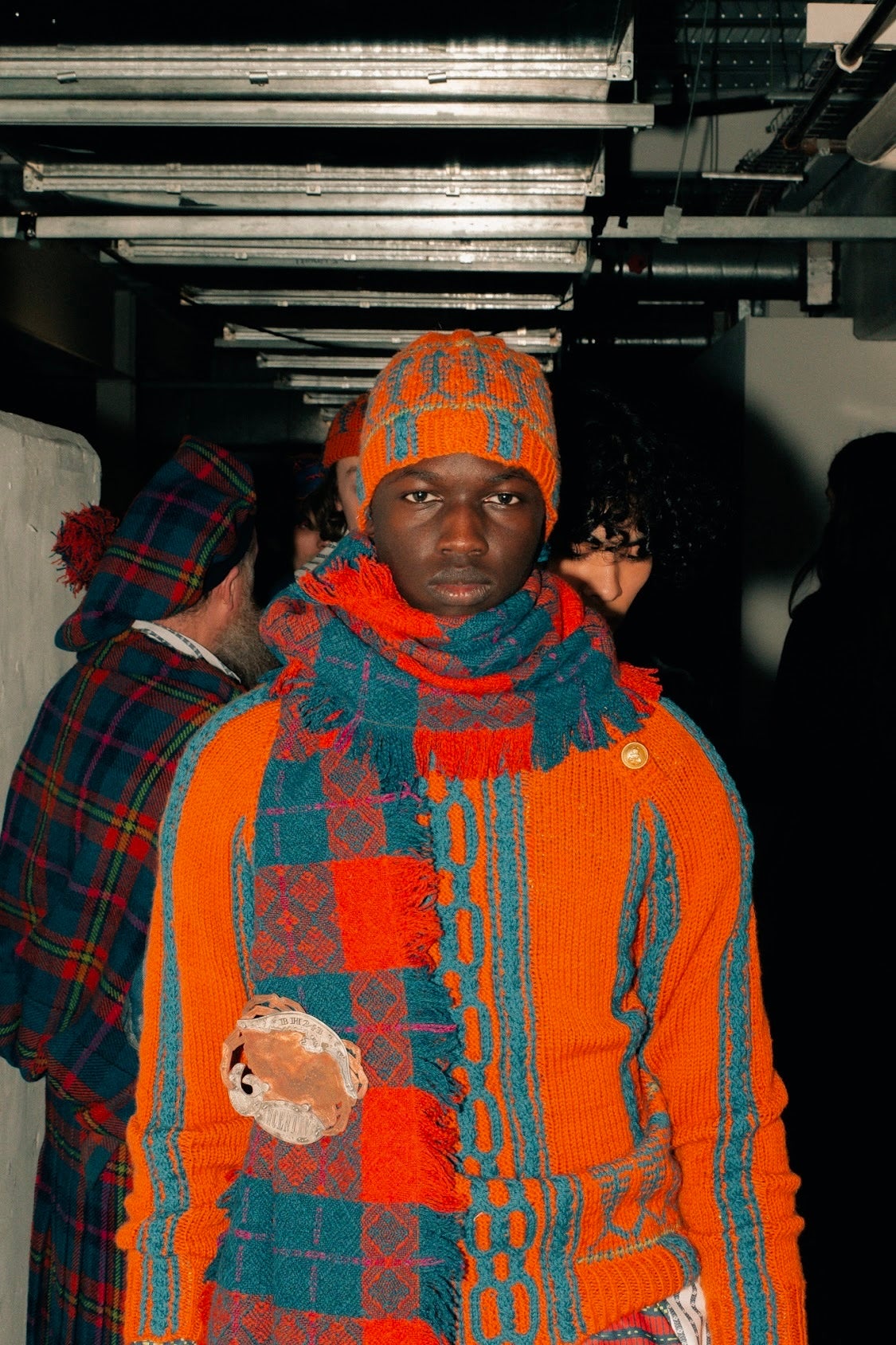 Look from Incentive shown at LFW; Fishermans jumper and hat hand knitted in British wool with diamond net wool scarf handwoven in Scotland and adorned with BH243 crab brooch handmade in Scotland.