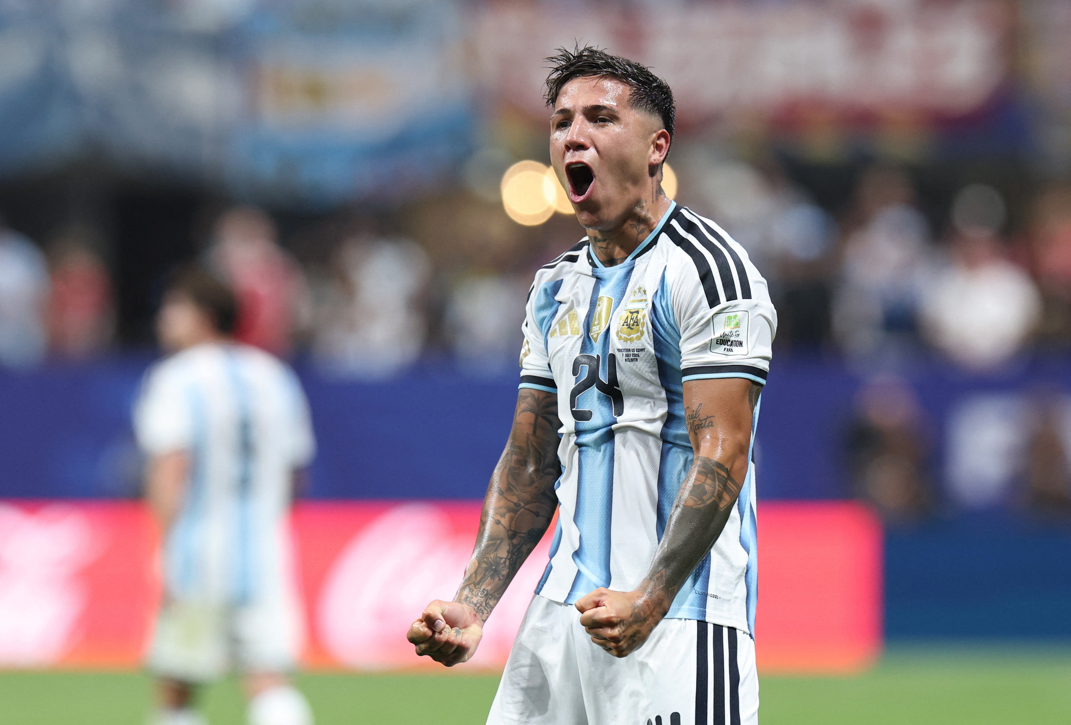 Argentina's Enzo Fernandez celebrates scoring their third goal (Reuters)