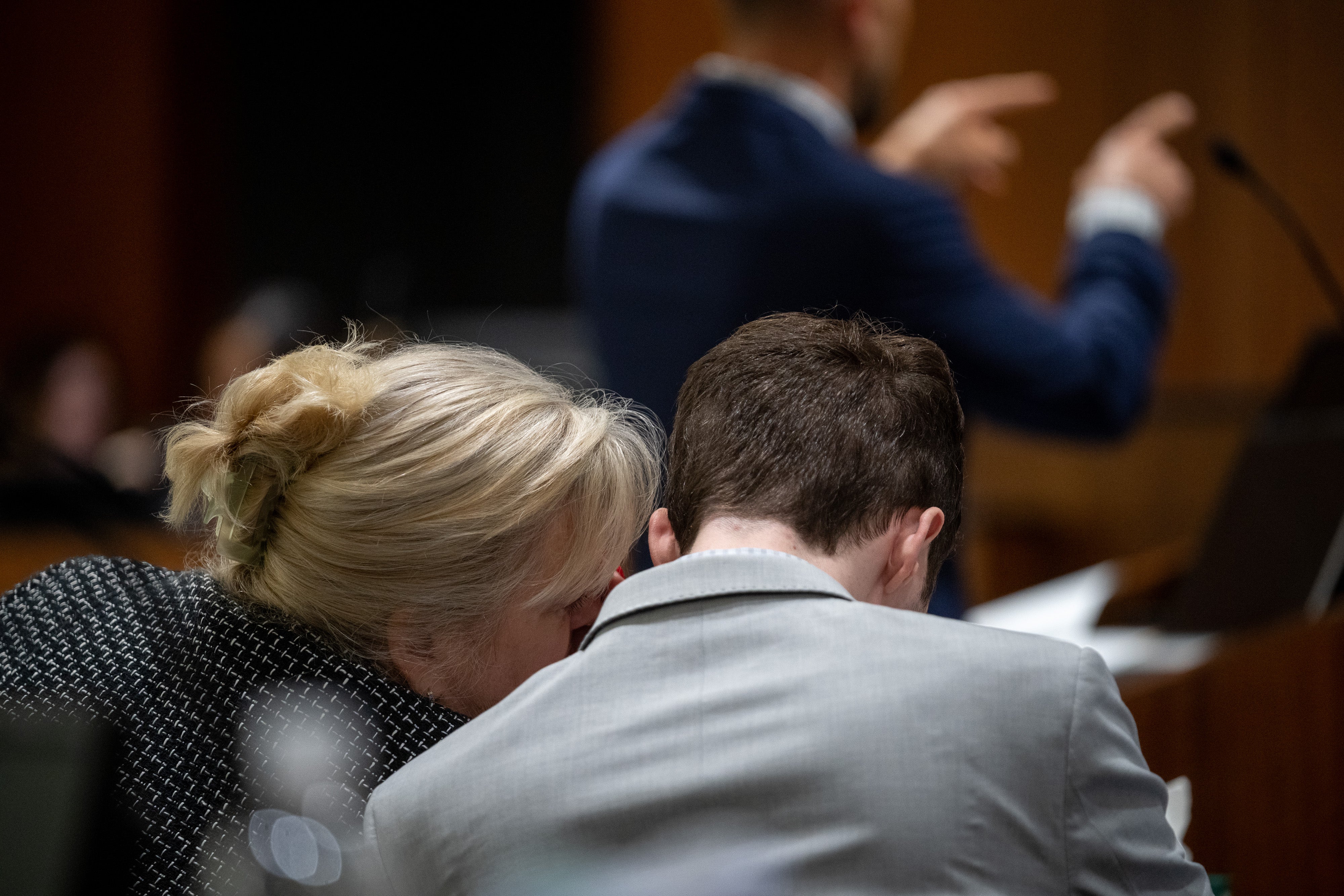 Defense attorney Kathryn Nester talks to Tyler Robinson