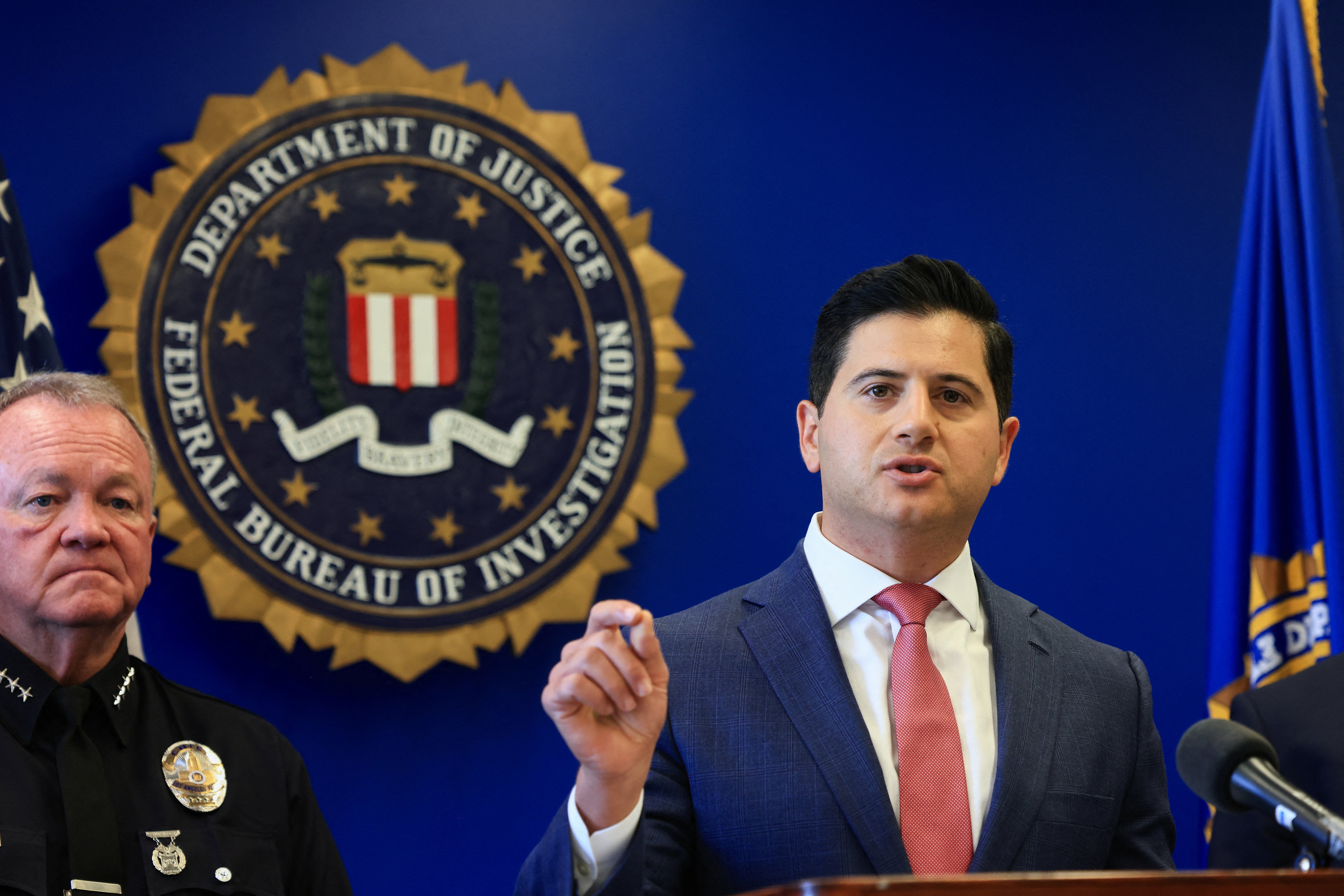 Assistant US attorney Bill Essayli speaks as American and Canadian law enforcement officials announce federal charges and arrests of alleged members of a transnational organised crime group in Los Angeles on 7 July 2026