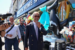 Nigel Farage walks in Frinton-On-Sea, after he announced on Tuesday that he has resigned as an MP, triggering a by-election in his parliamentary seat