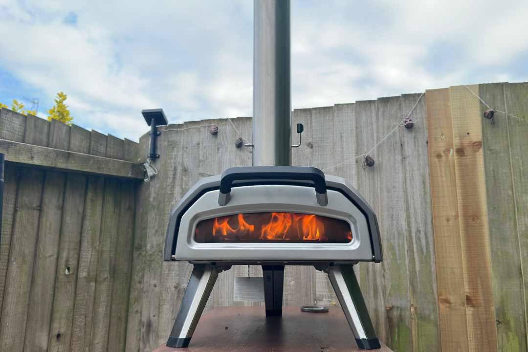 The glass door to the front has a viewing window so you can keep an eye on the fire and when to turn the pizza (Rachael Penn/The Independent)