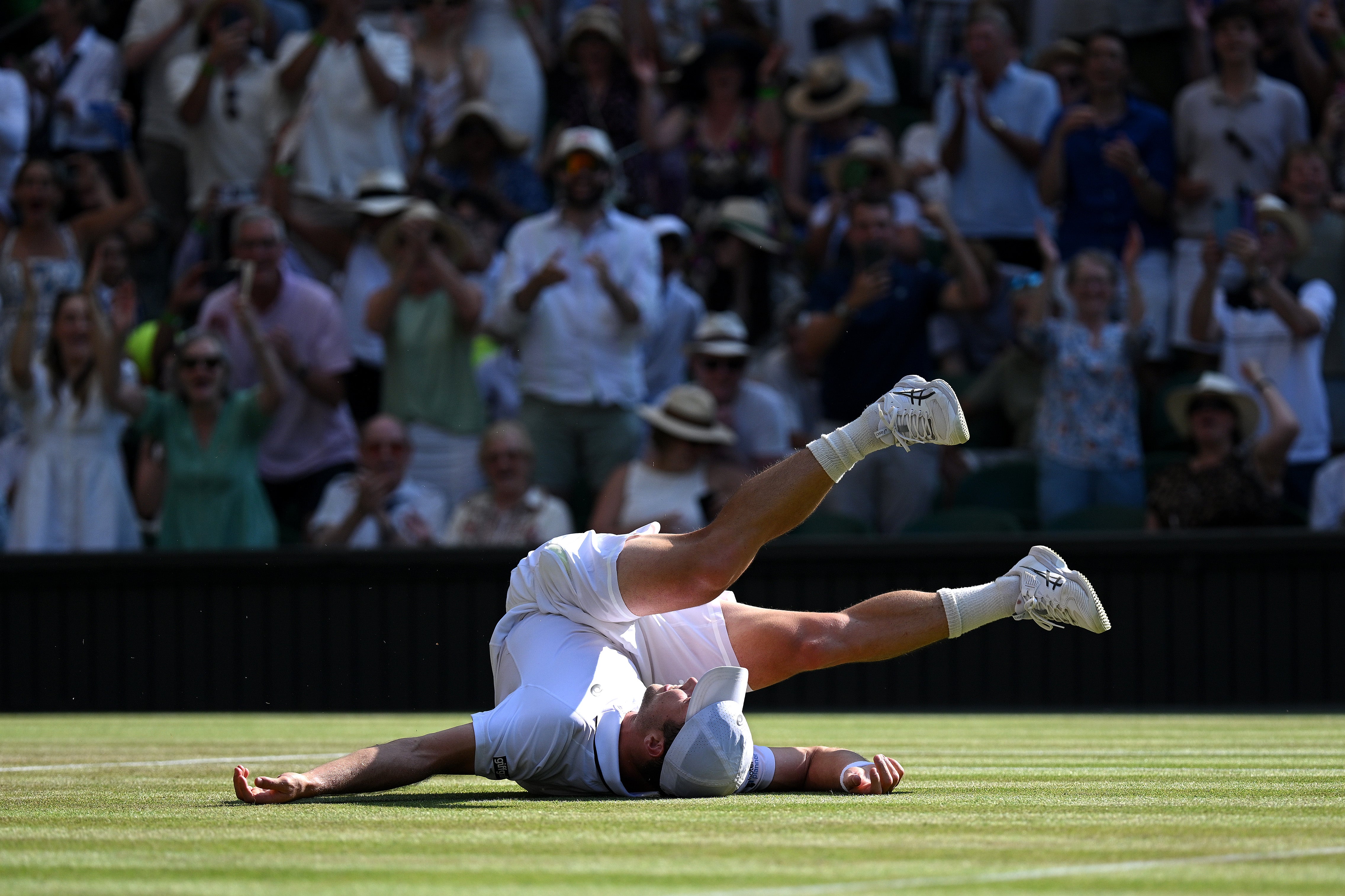 He collapsed to the turf in disbelief as he sealed the match with an ace