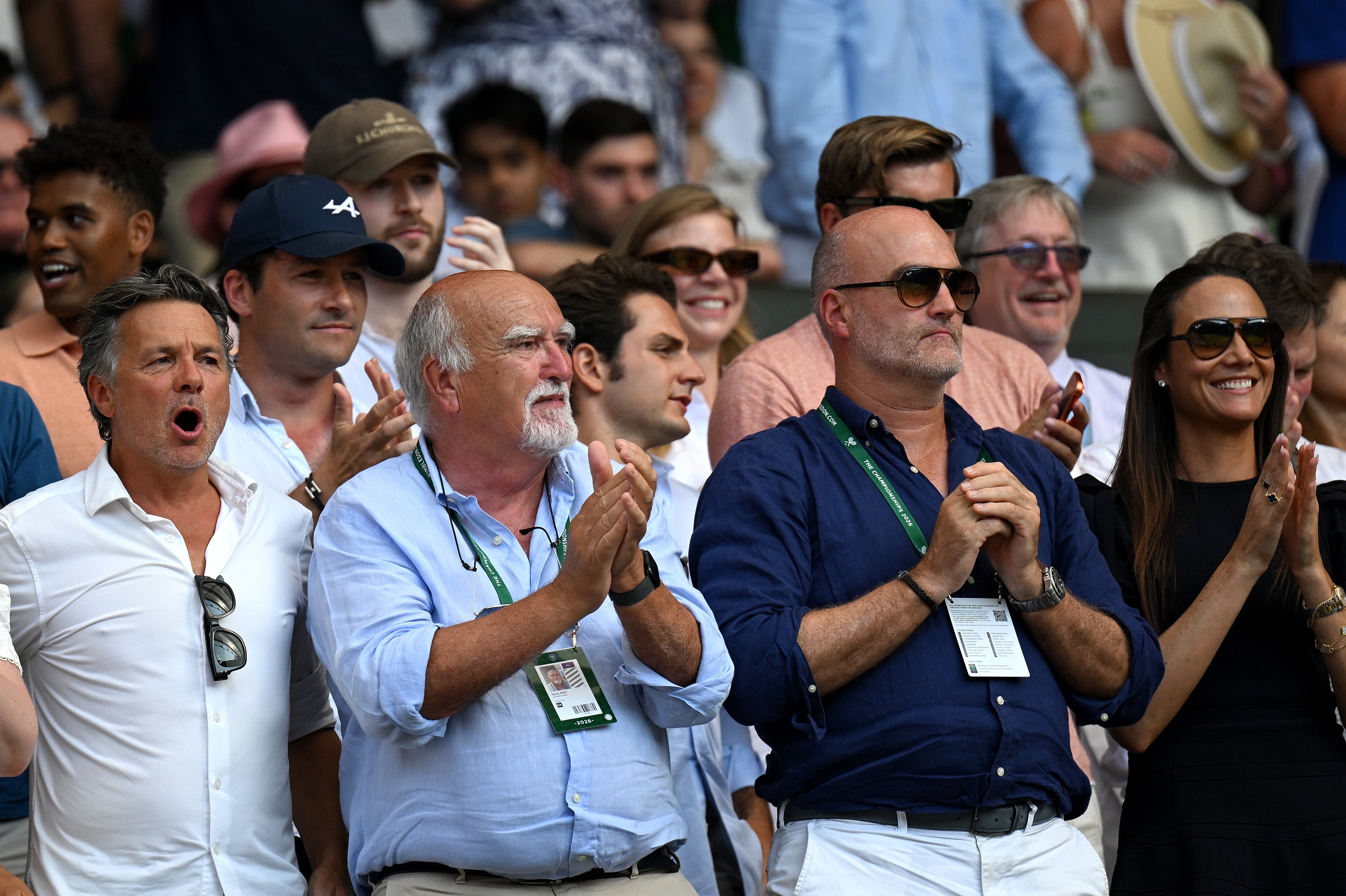 Loic and Denis Fery, father and grandfather of Arthur Fery, watched on from Centre Court