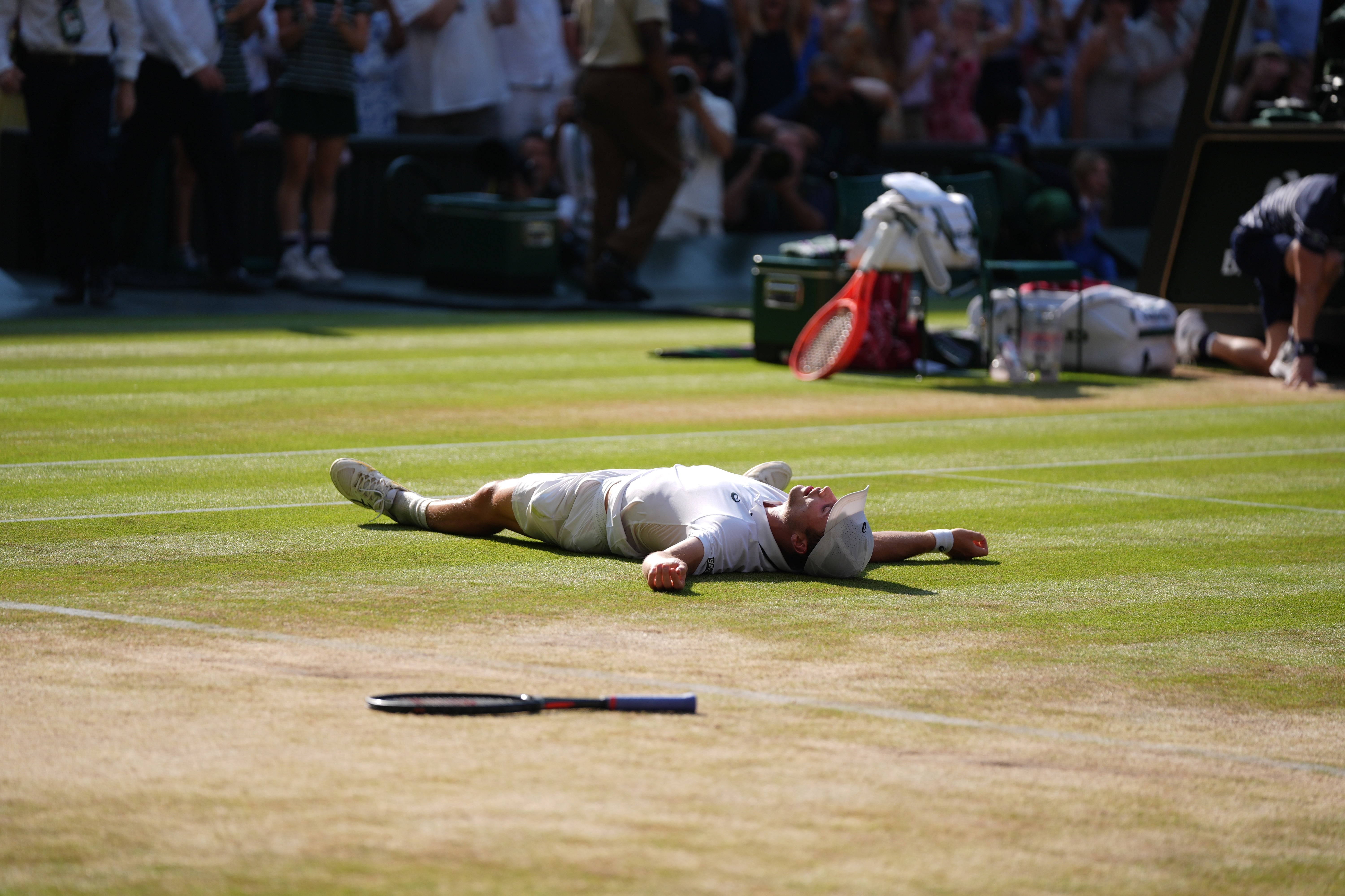 Arthur Fery fell to his back in disbelief after winning match point