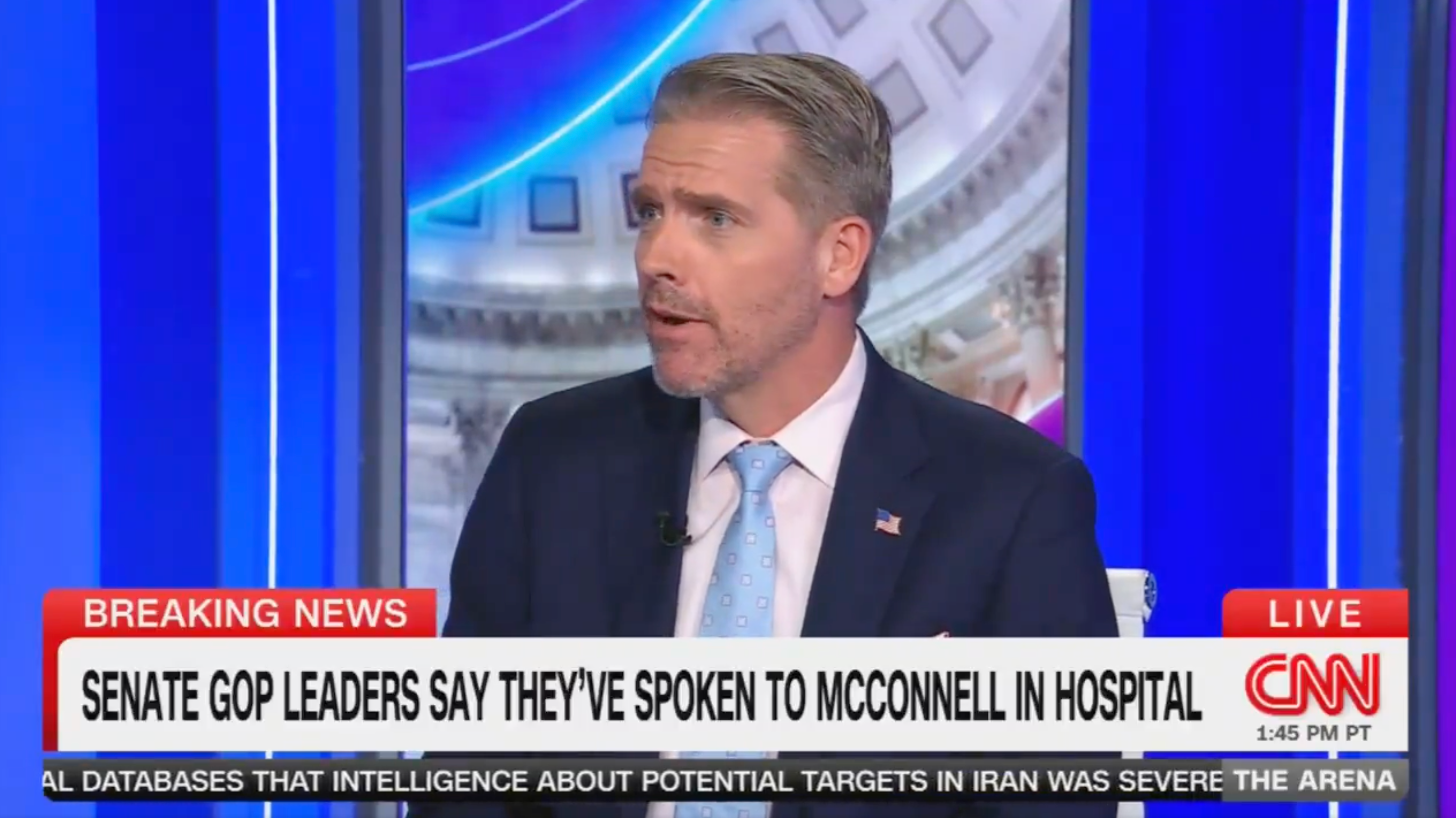 CNN commentator Scott Jennings is challenged to call ailing Kentucky Republican Sen. Mitch McConnell live on air to dispel rumors about the veteran's health