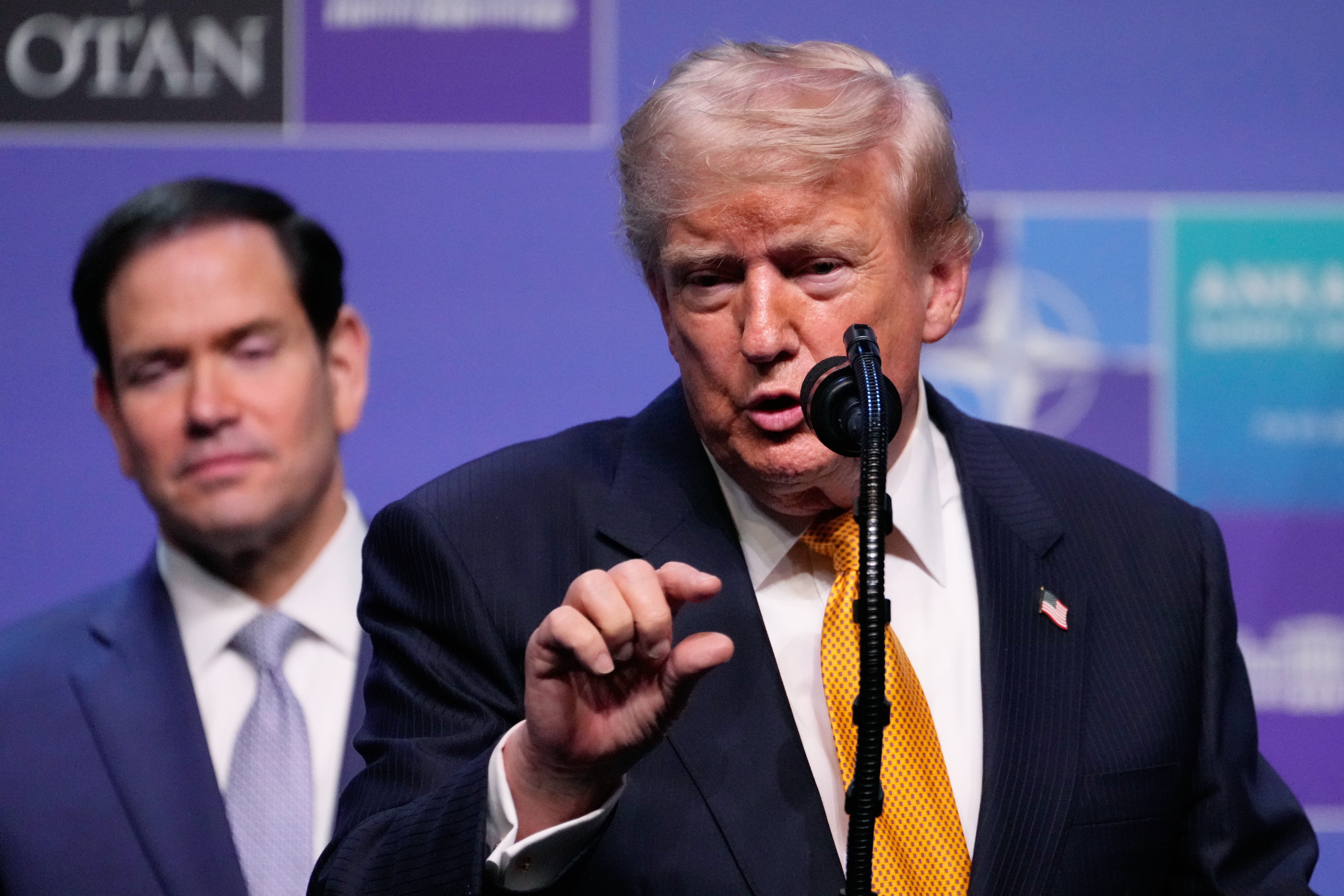 President Donald Trump speaks during a media conference at the Nato summit in Ankara, Turkey (Hussein Malla/AP)