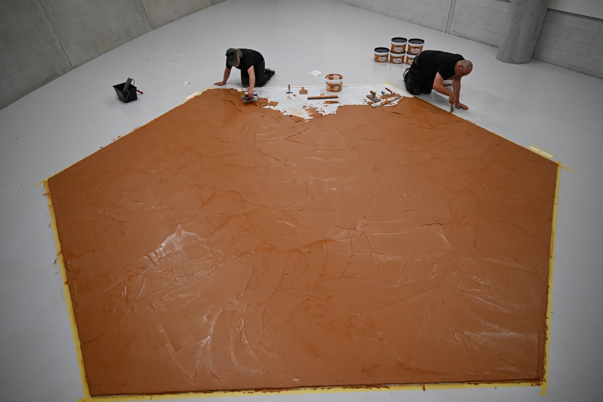 Peanut-butter floor display returns to Dutch museum as tribute to late artist